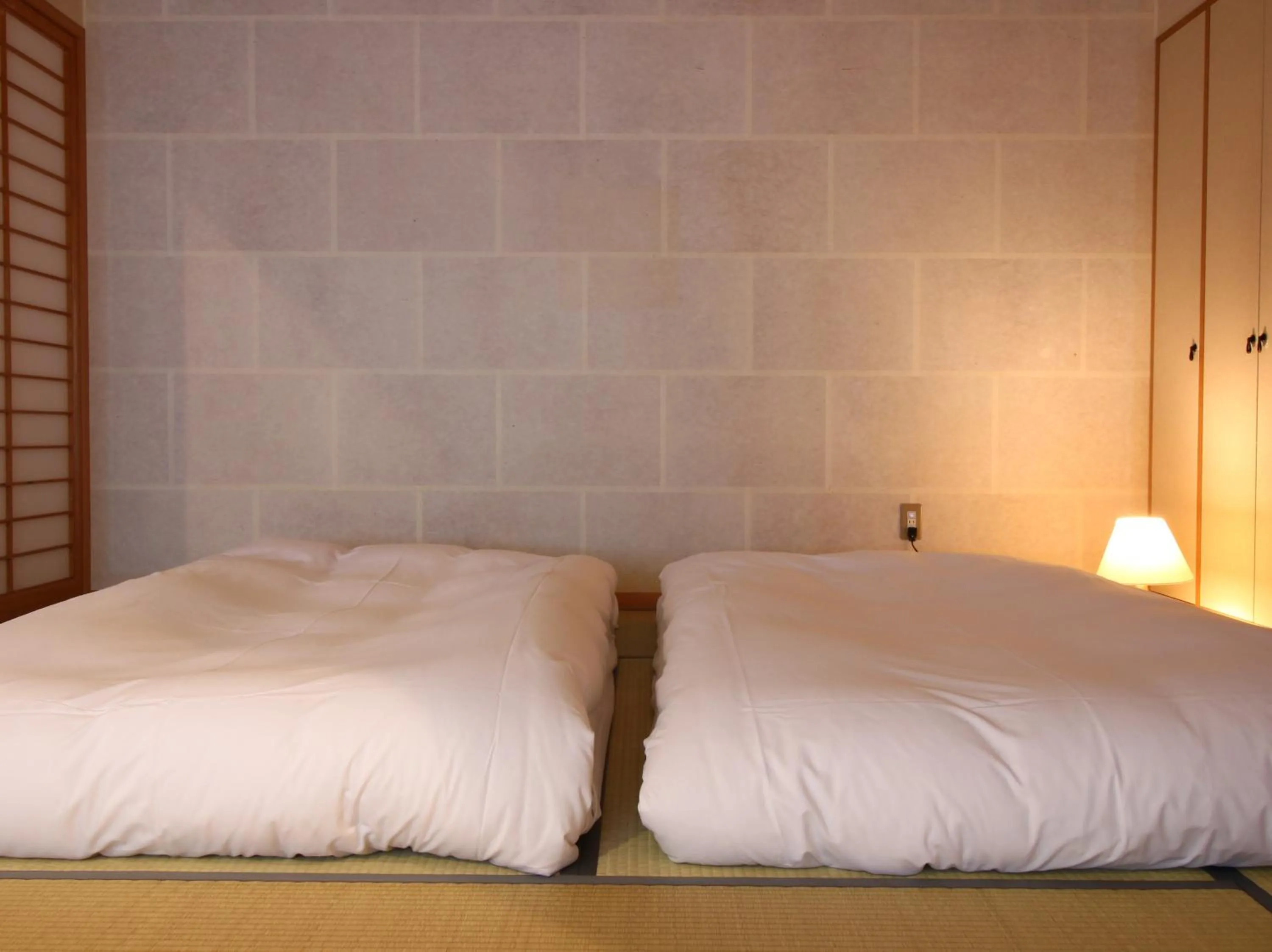 Photo of the whole room, Bed in Itamuro Onsen Daikokuya