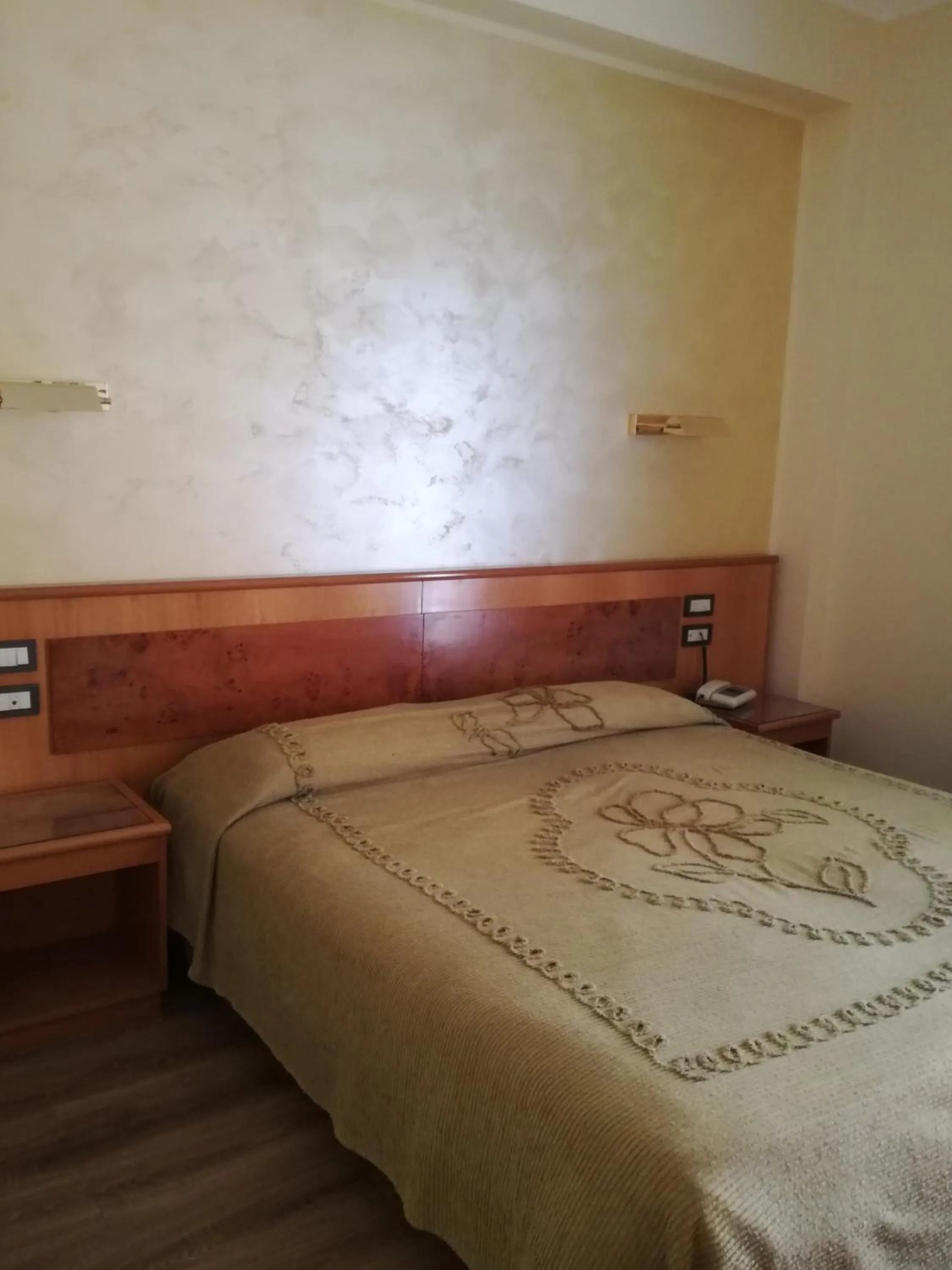 Bed in FILIPPONE HOTEL&RISTORANTE