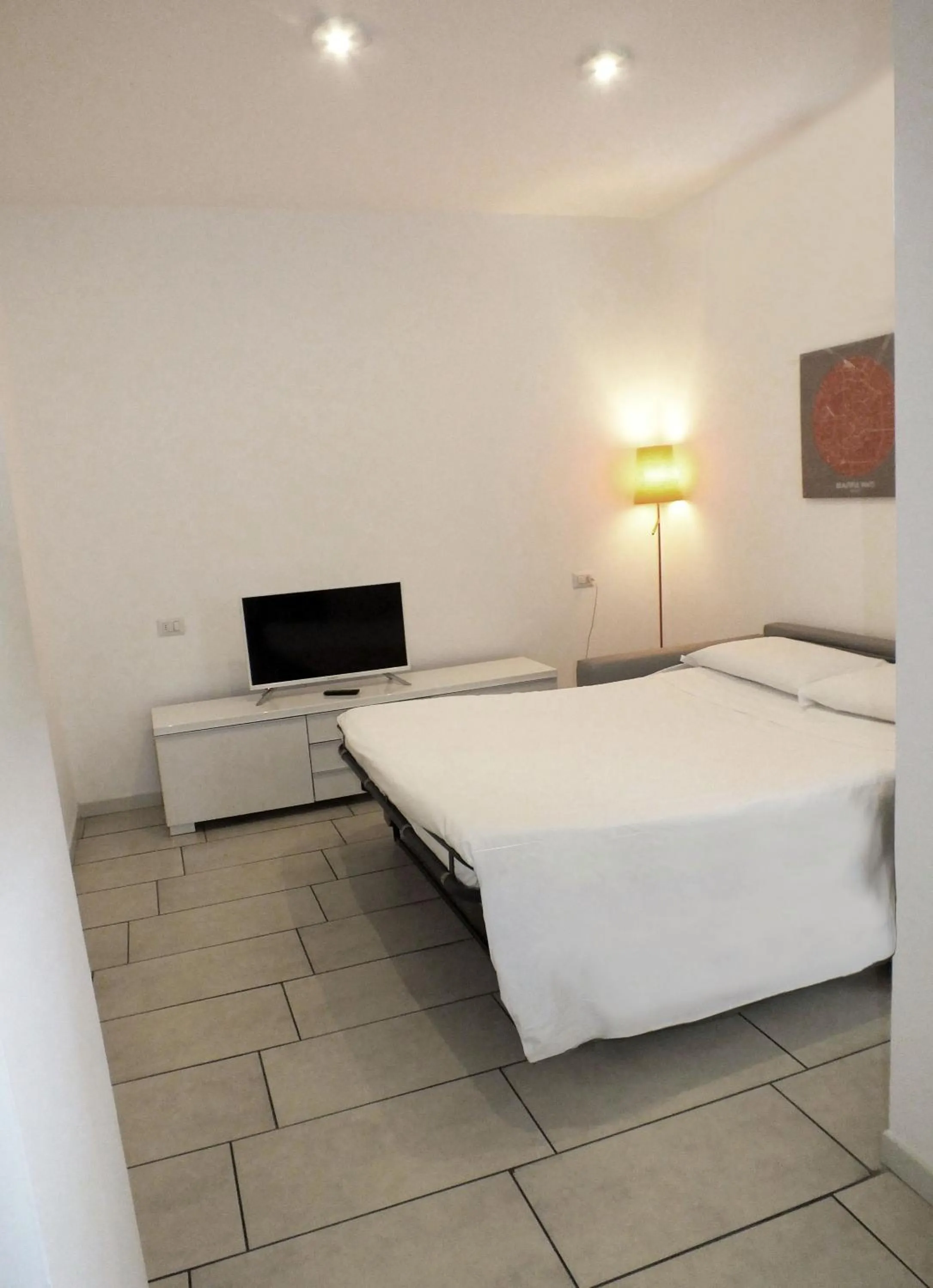 Living room, Bed in BB Hotels Aparthotel Visconti