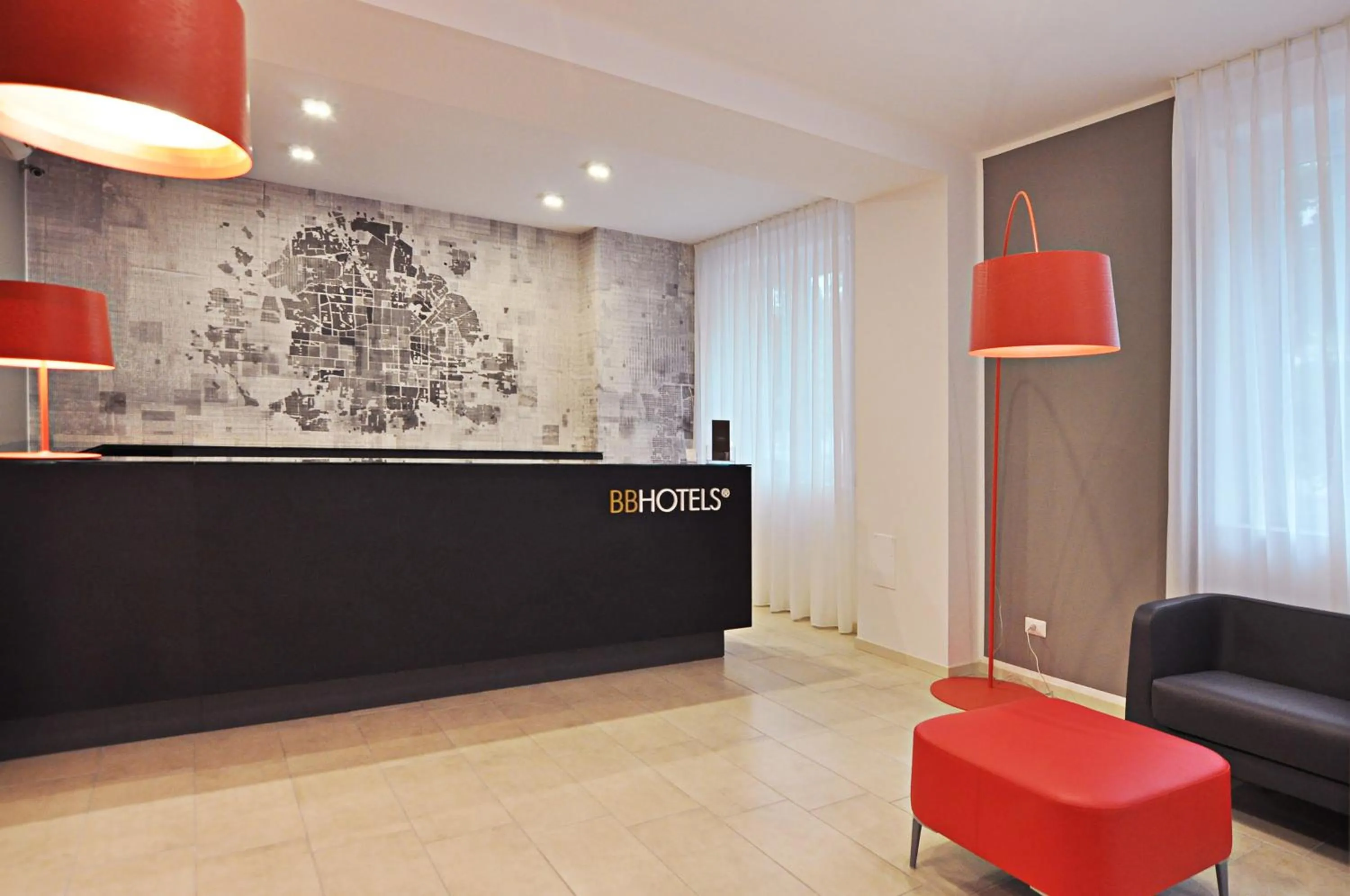 Lobby or reception in BB Hotels Aparthotel Visconti