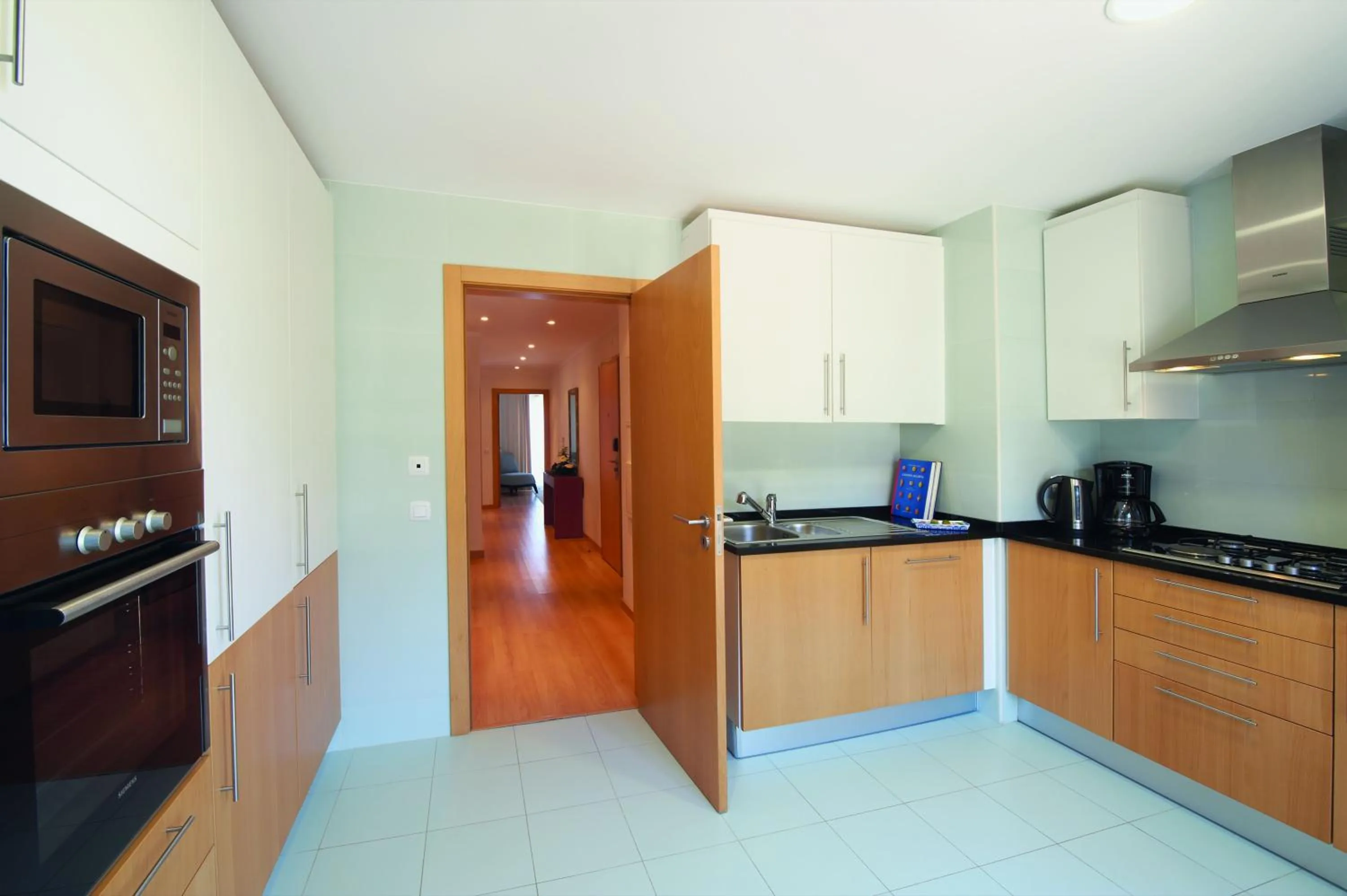 Kitchen or kitchenette in Real Marina Residence