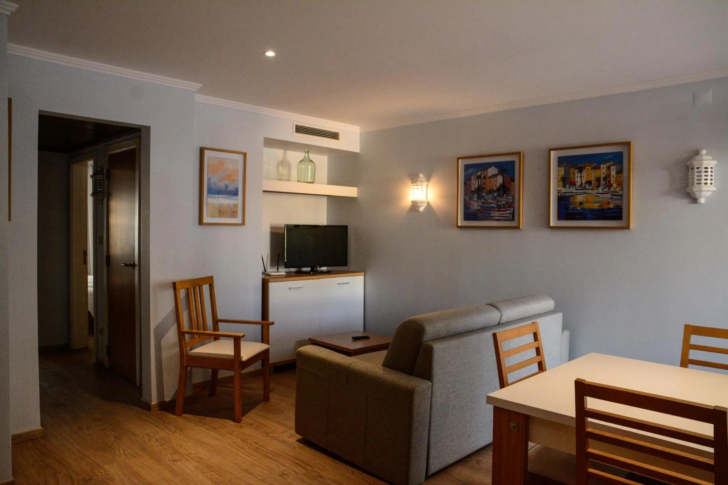 Living room in Apartamentos Honorio - Pool and Garden