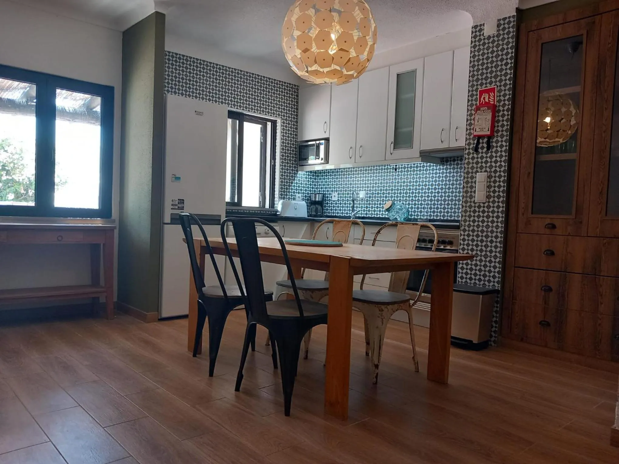 Kitchen or kitchenette in Apartamentos Honorio - Pool and Garden