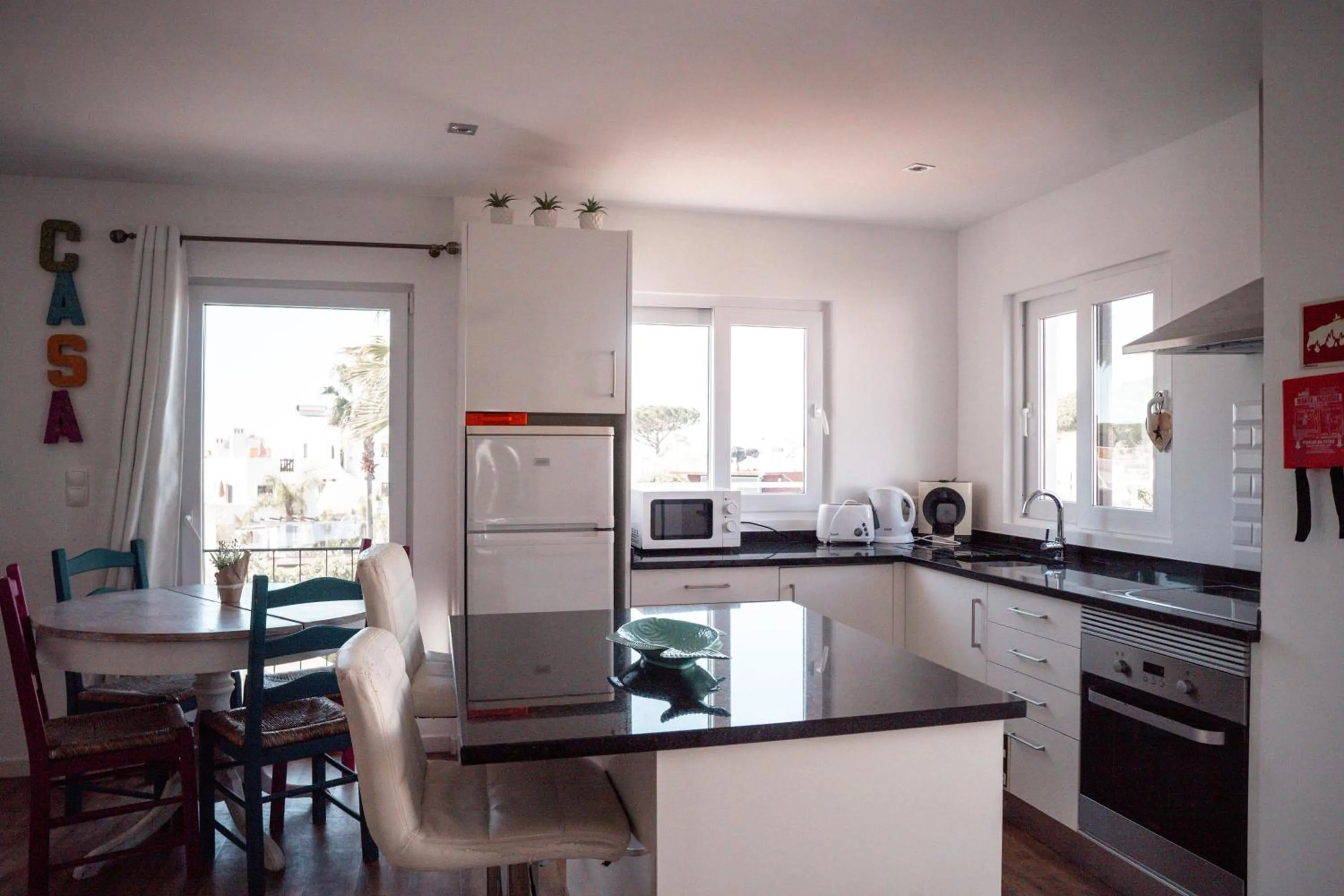 kitchen in Apartamentos Honorio - Pool and Garden