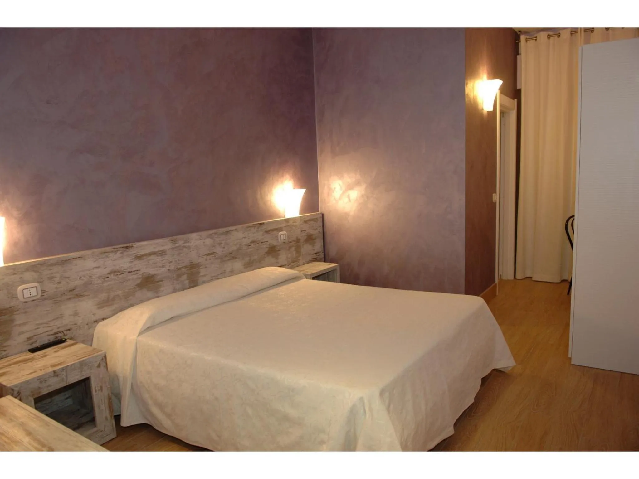 Photo of the whole room, Bed in Hotel La Rosa dei Venti