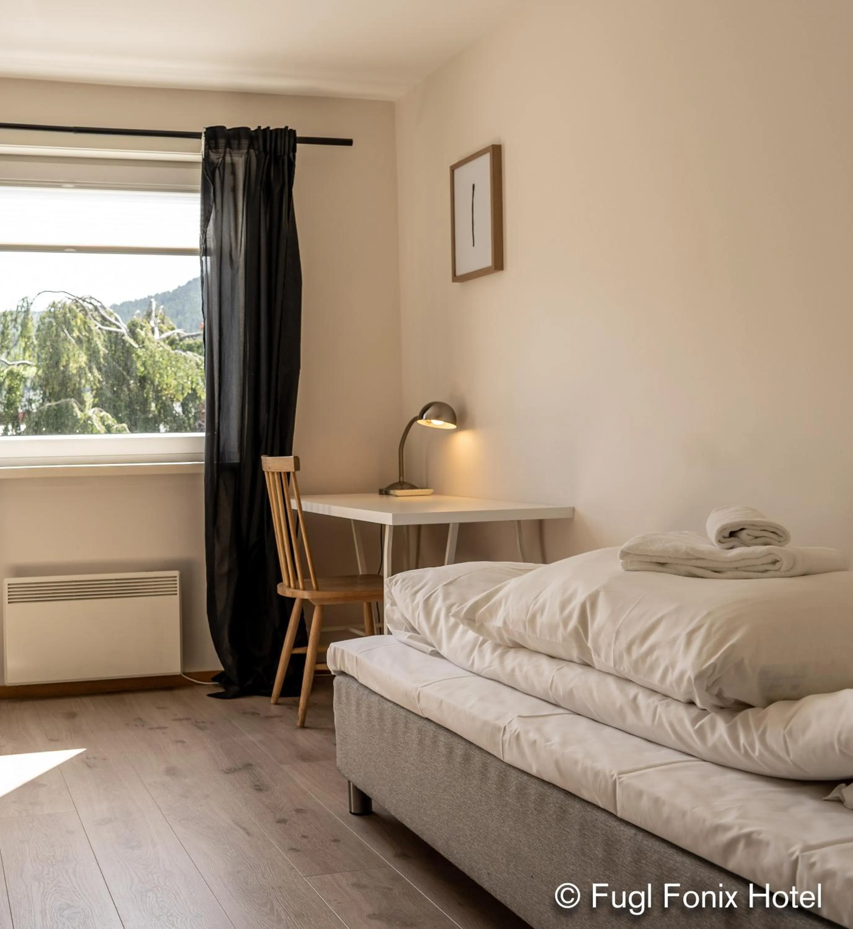 Bed in Fugl Fønix Hotel