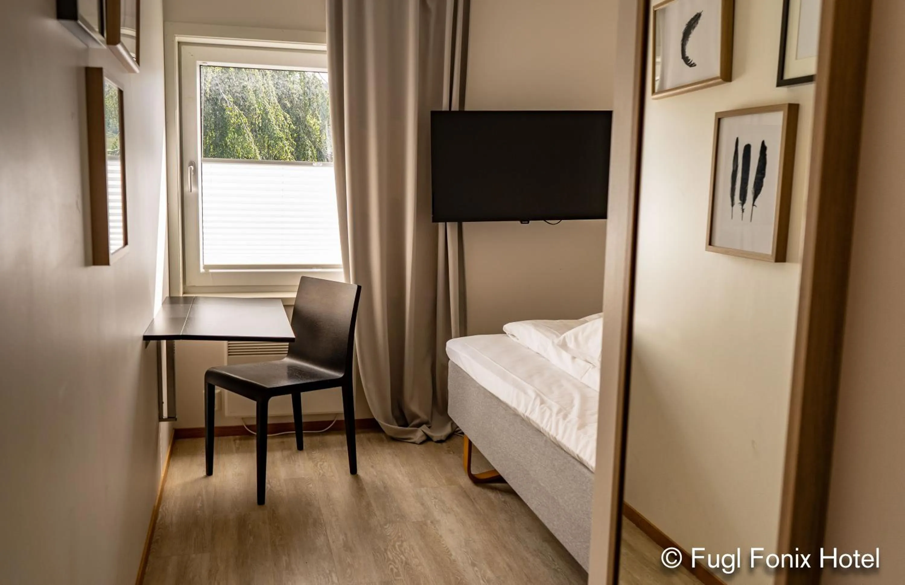 Bed in Fugl Fønix Hotel