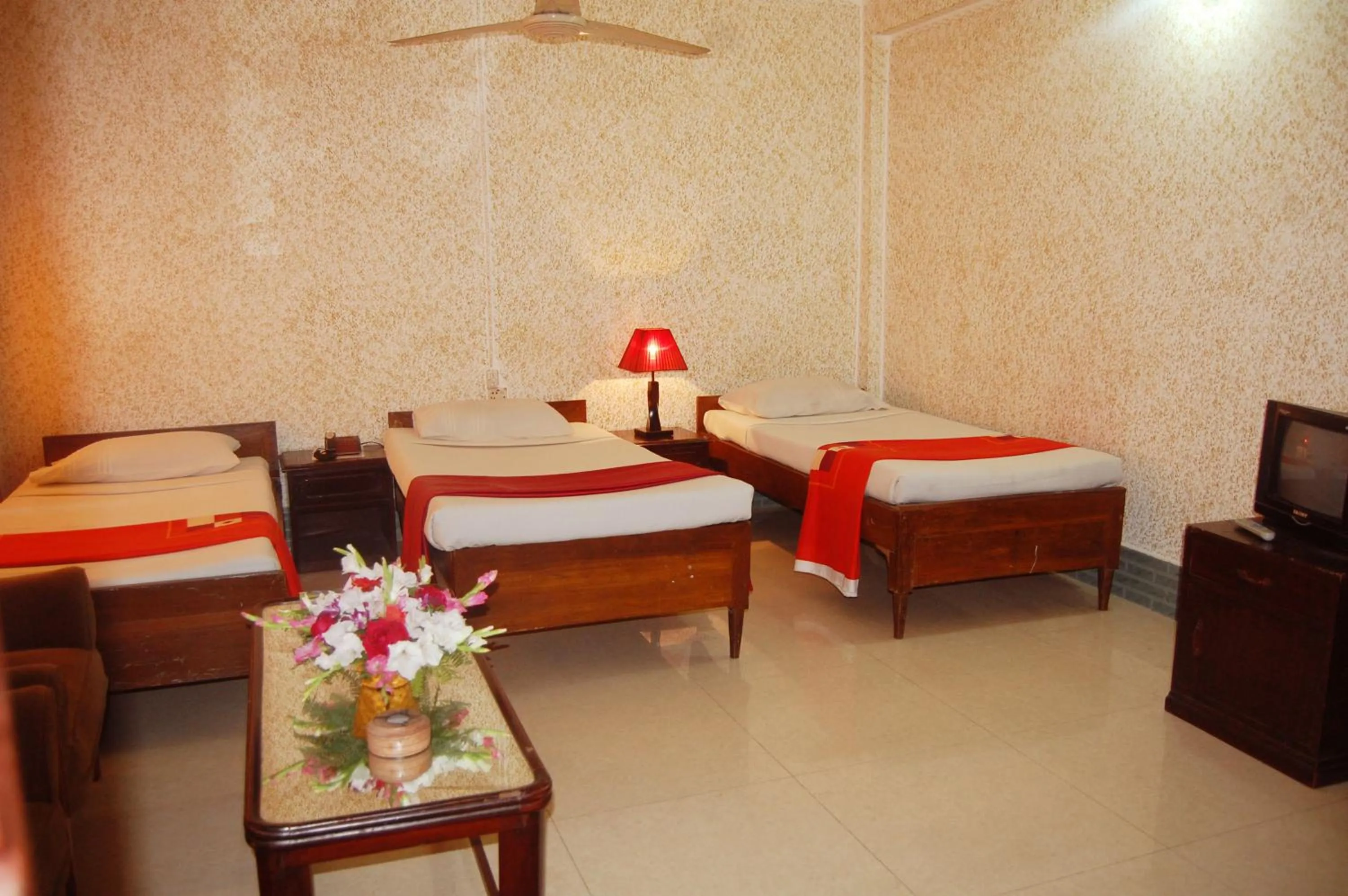 Bed in Hotel Swiss Garden International