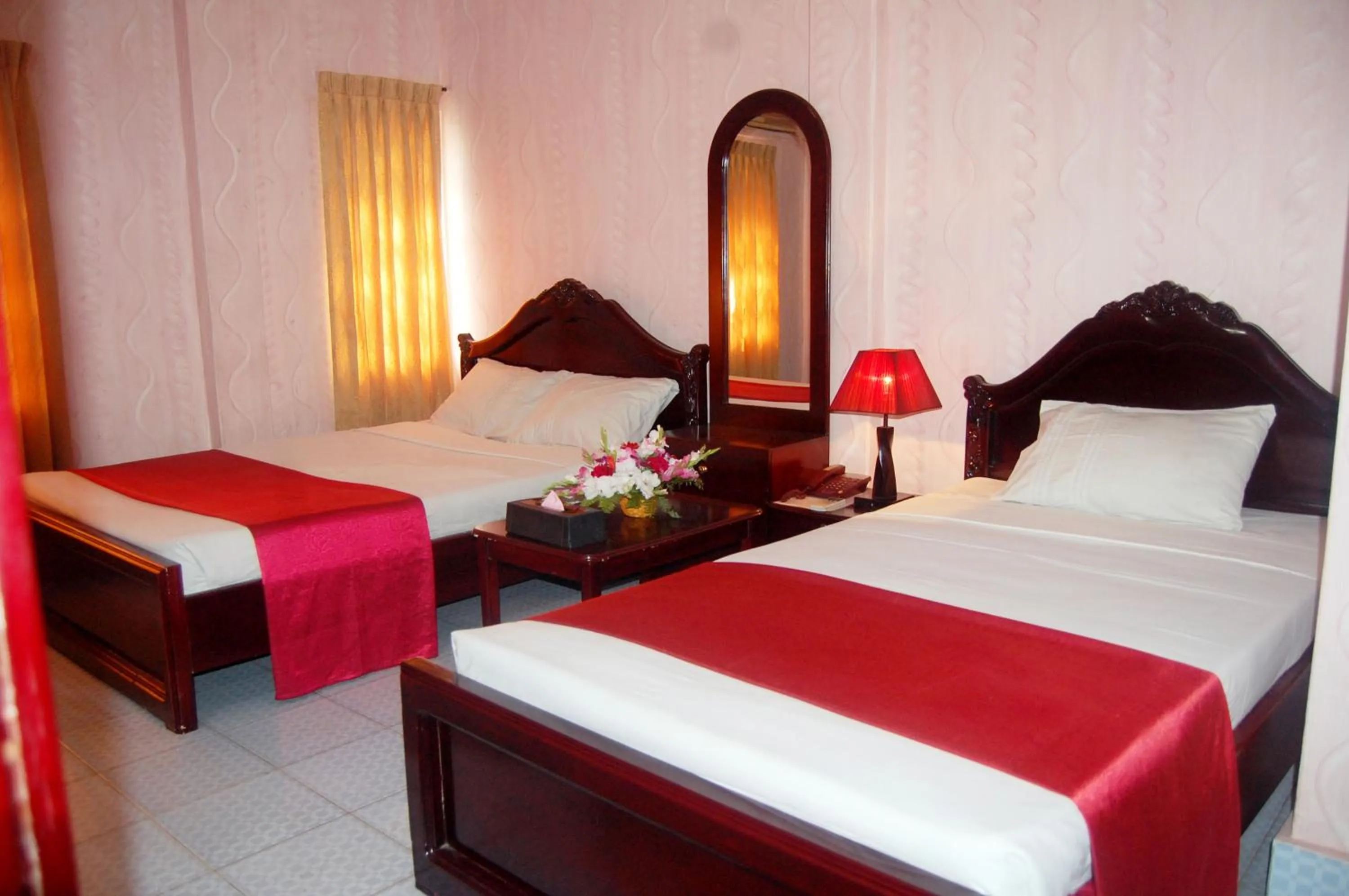 Bed in Hotel Swiss Garden International