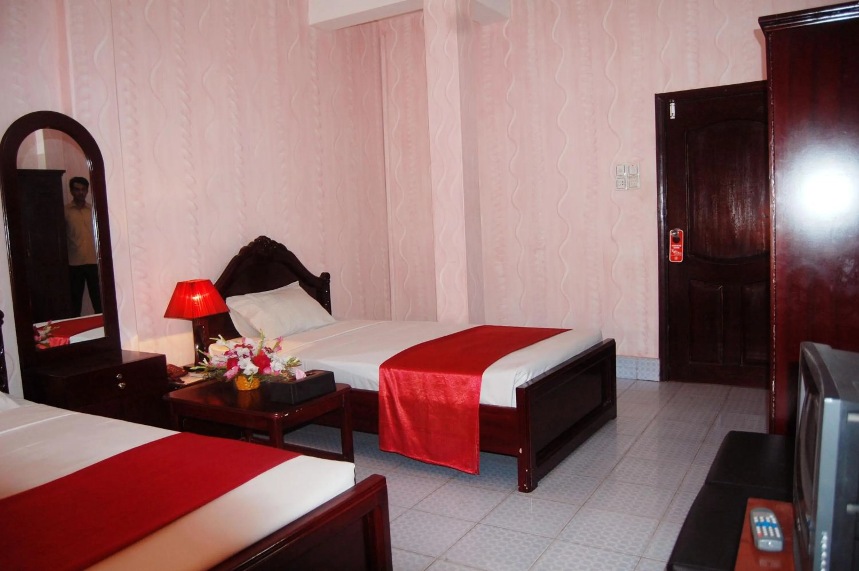 Bed in Hotel Swiss Garden International