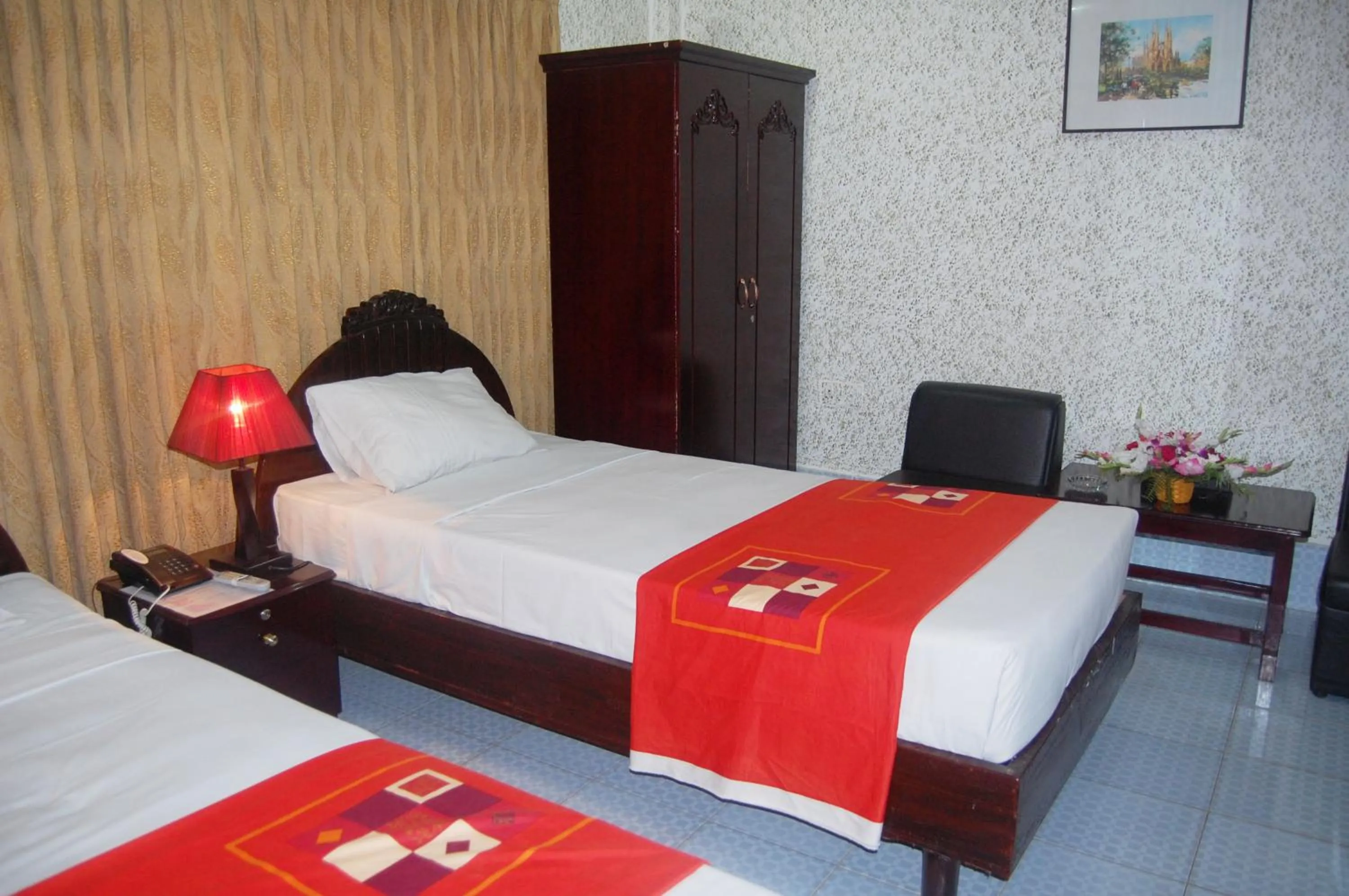 Bed in Hotel Swiss Garden International