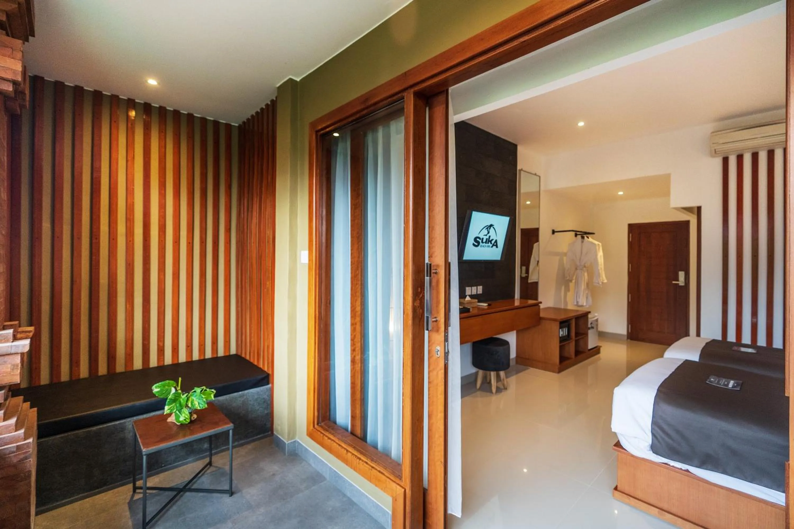 Bedroom, Bed in Suka Beach Inn