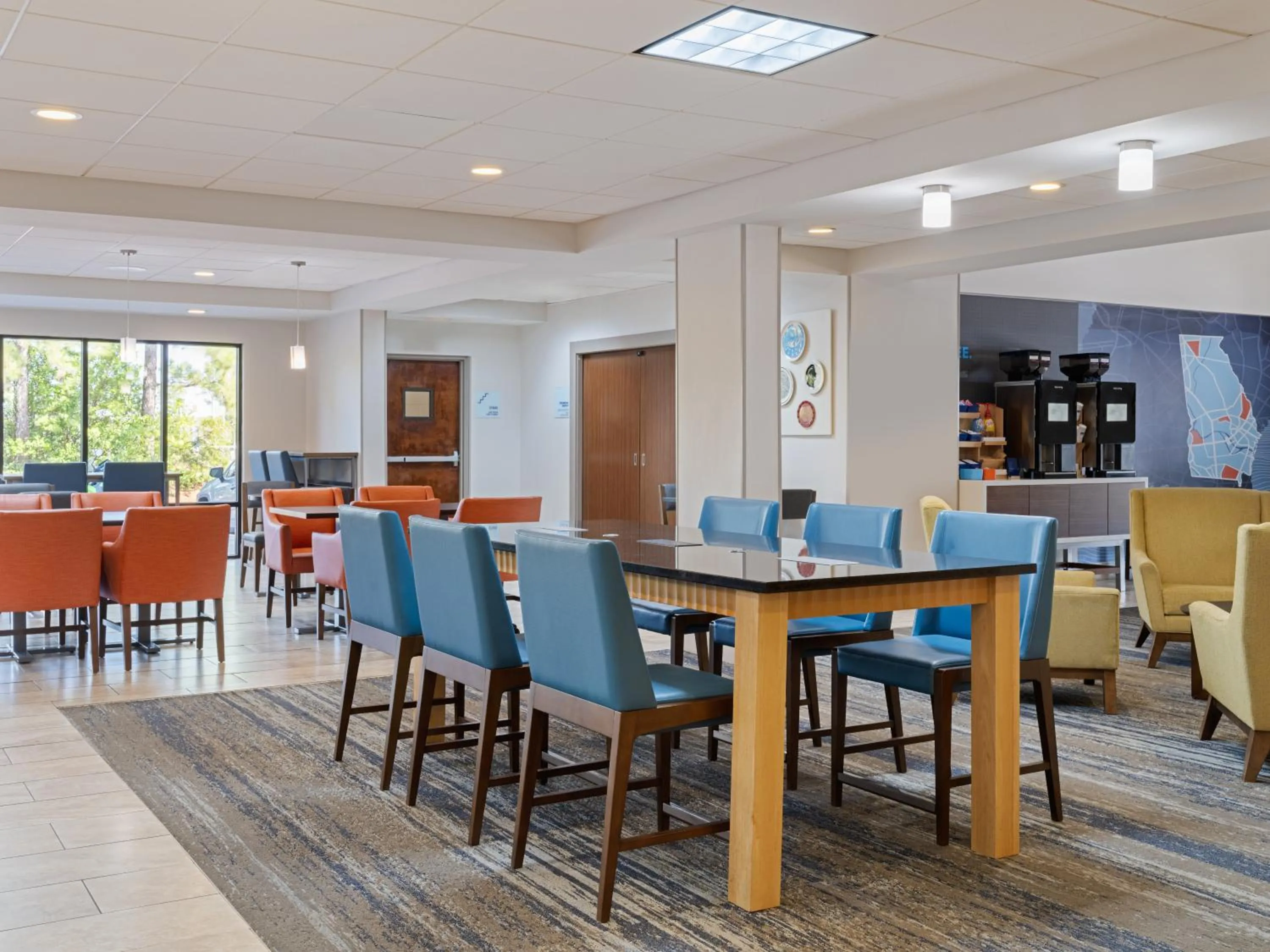 Communal lounge/ TV room in Holiday Inn Express & Suites Augusta West - Ft Gordon Area by IHG