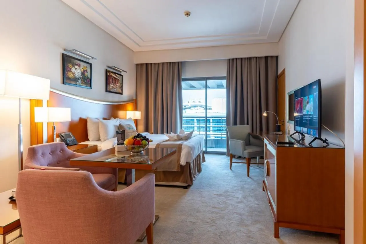 Bed in Grand Bellevue Hotel Apartment Dubai