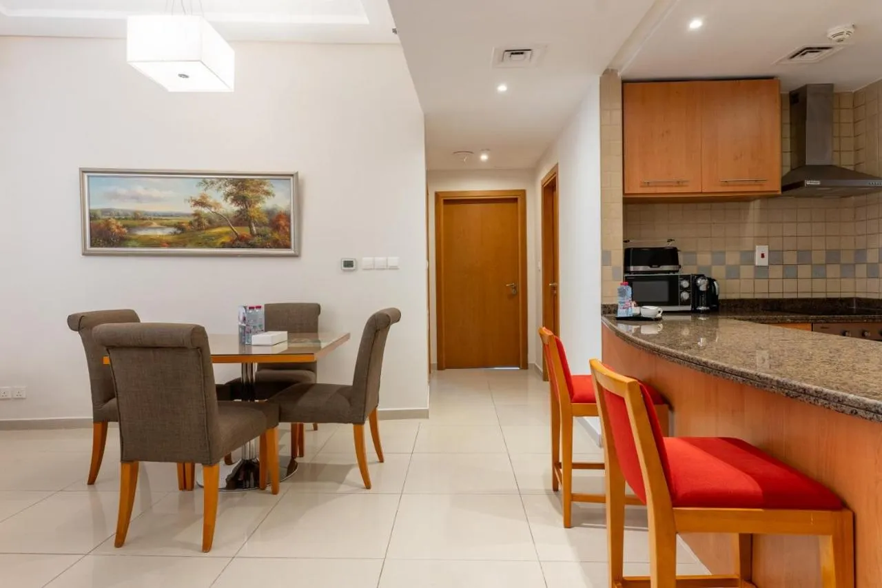 Kitchen or kitchenette in Grand Bellevue Hotel Apartment Dubai