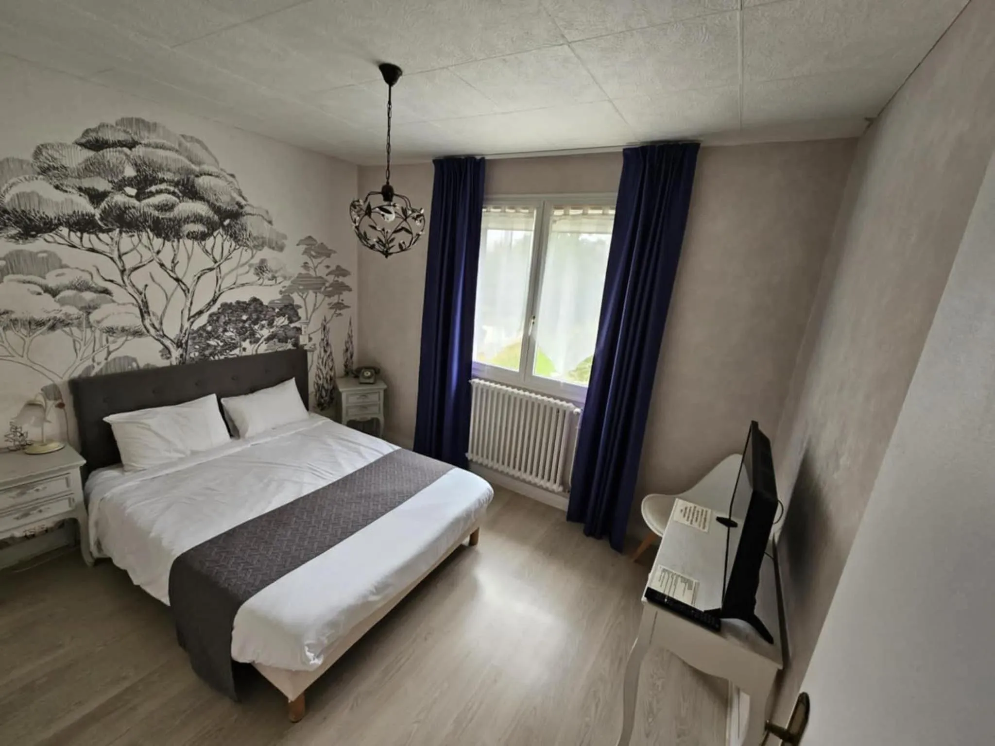 Bed in Hotel du Commerce Chez Stéphane