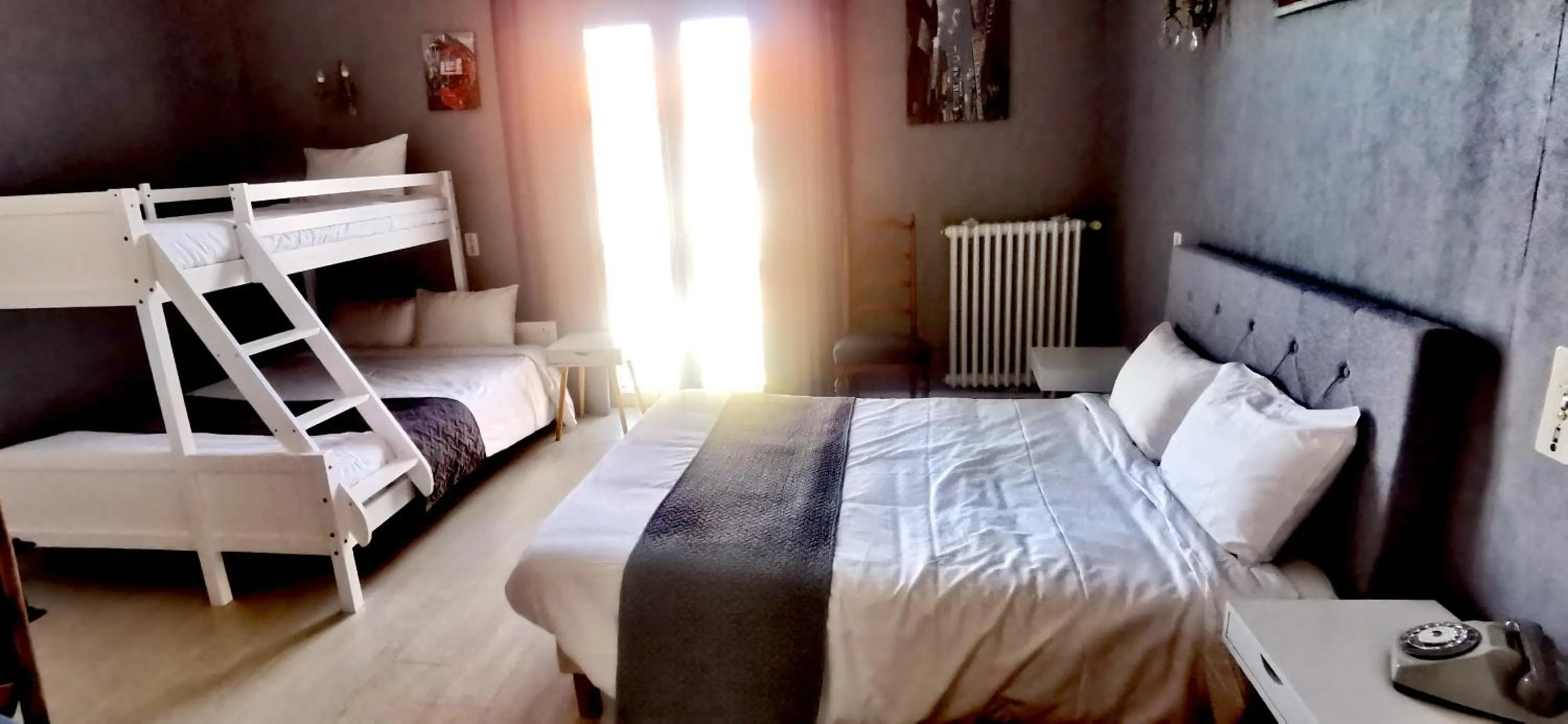 Bed in Hotel du Commerce Chez Stéphane