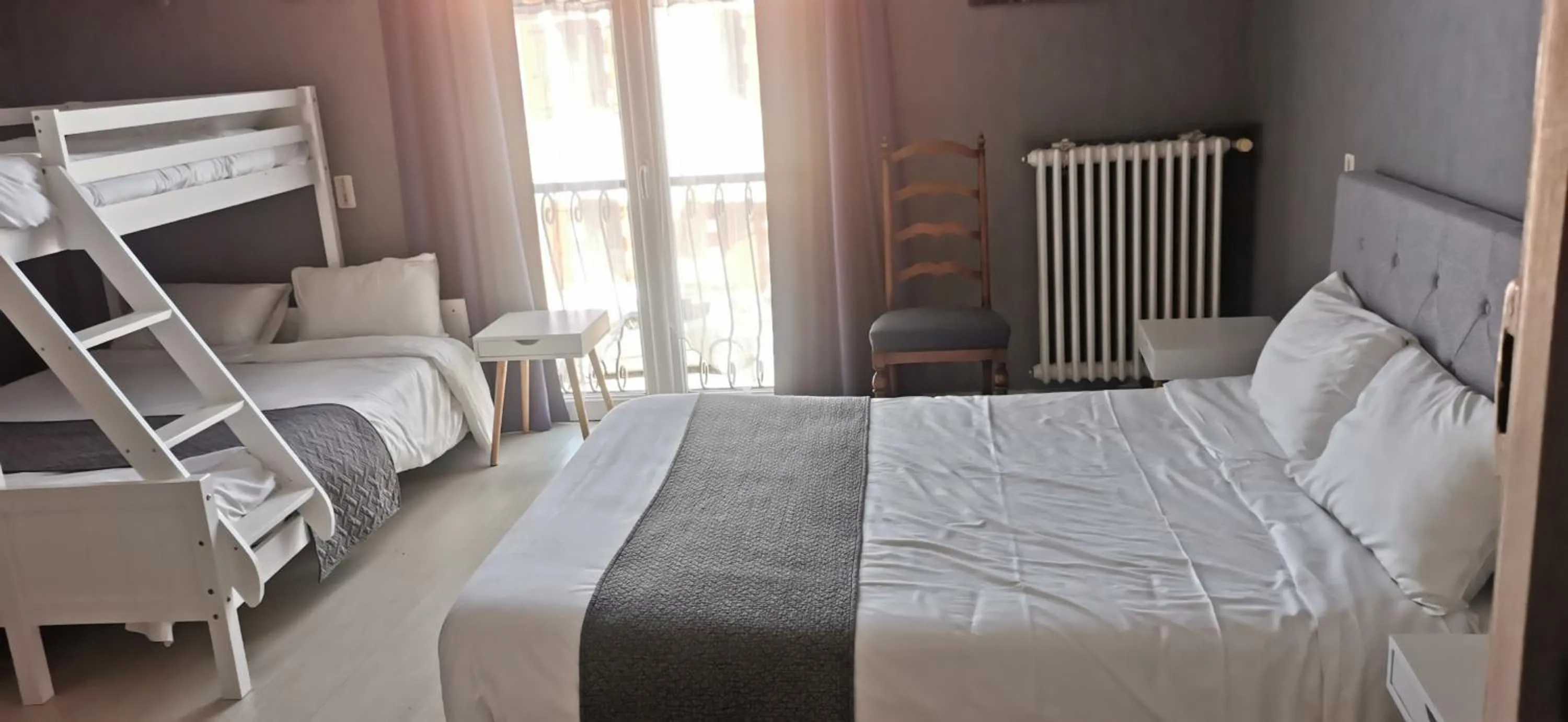 Bed in Hotel du Commerce Chez Stéphane