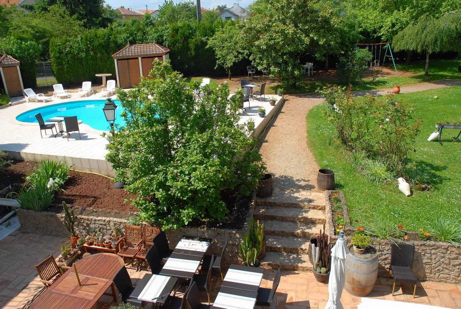 Pool view in Hotel du Commerce Chez Stéphane