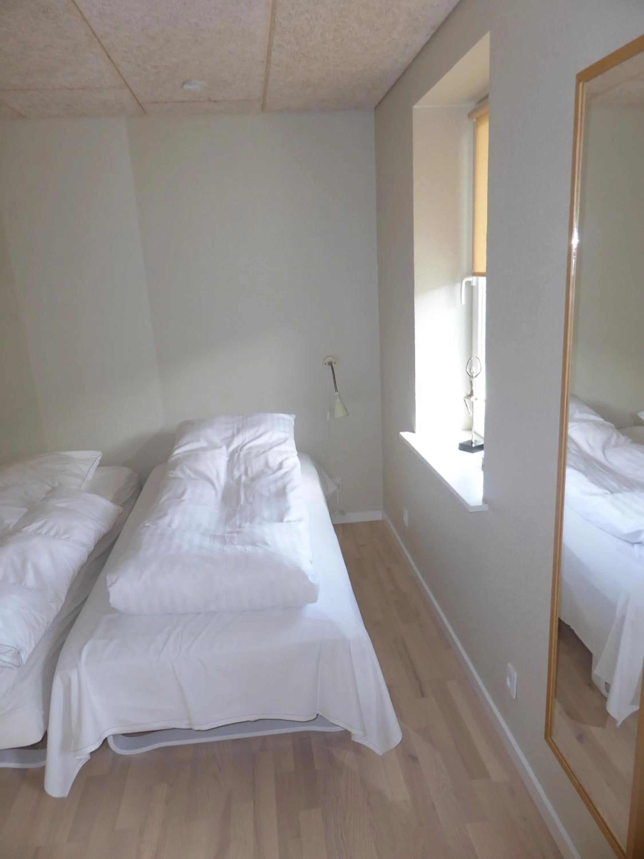 Bedroom, Bed in Harboøre Hotel