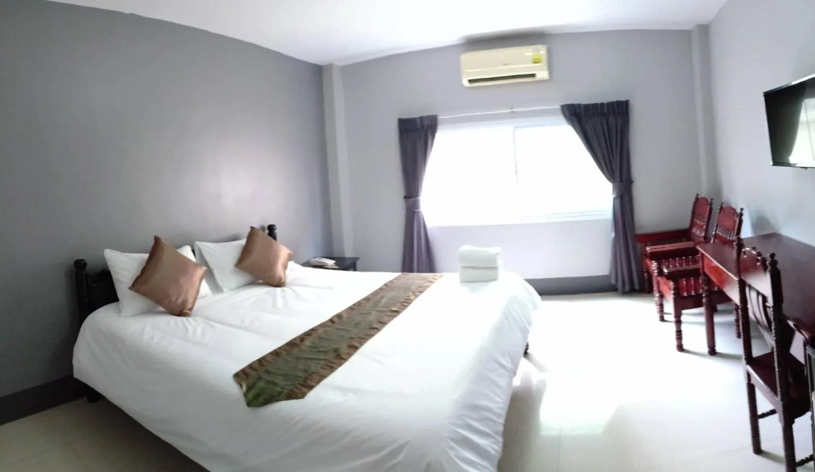 Bed in Submukda Phoomplace Hotel