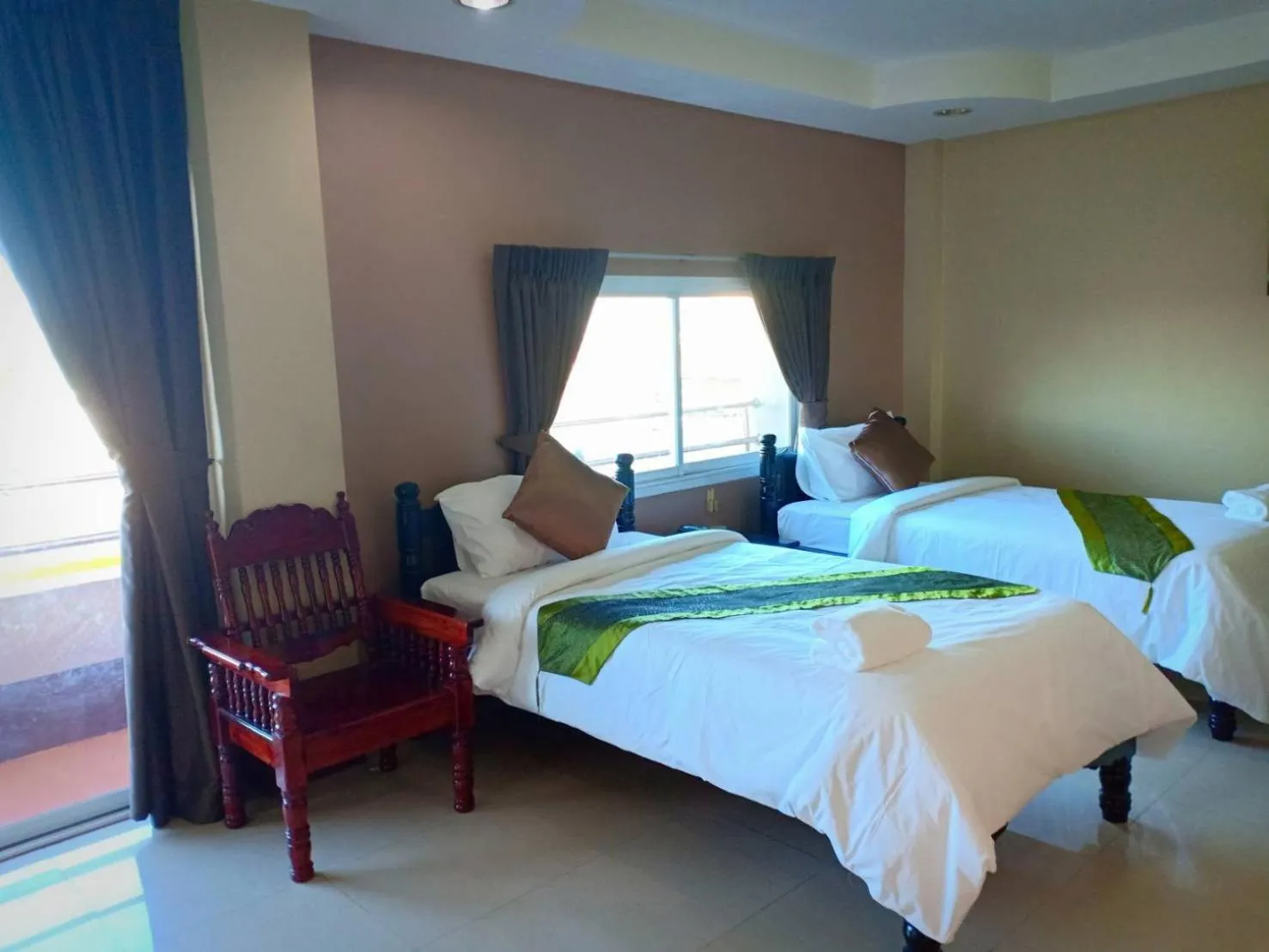 Bed in Submukda Phoomplace Hotel