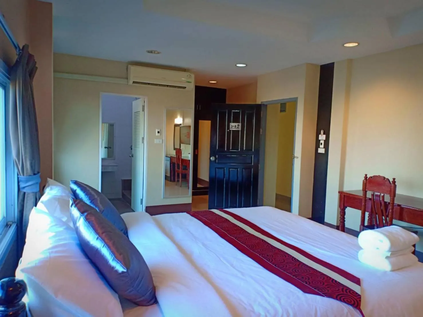 Bed in Submukda Phoomplace Hotel