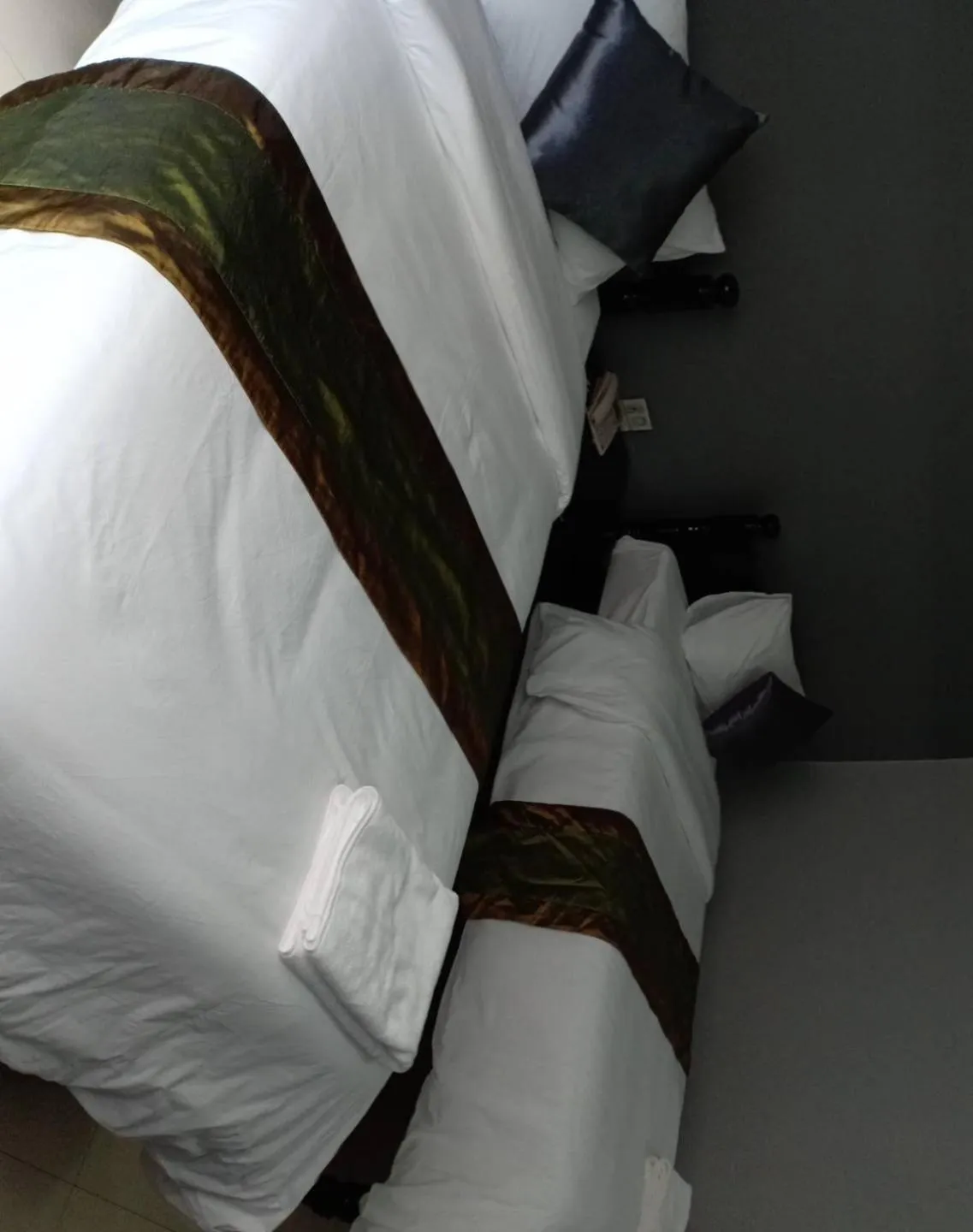 Bed in Submukda Phoomplace Hotel