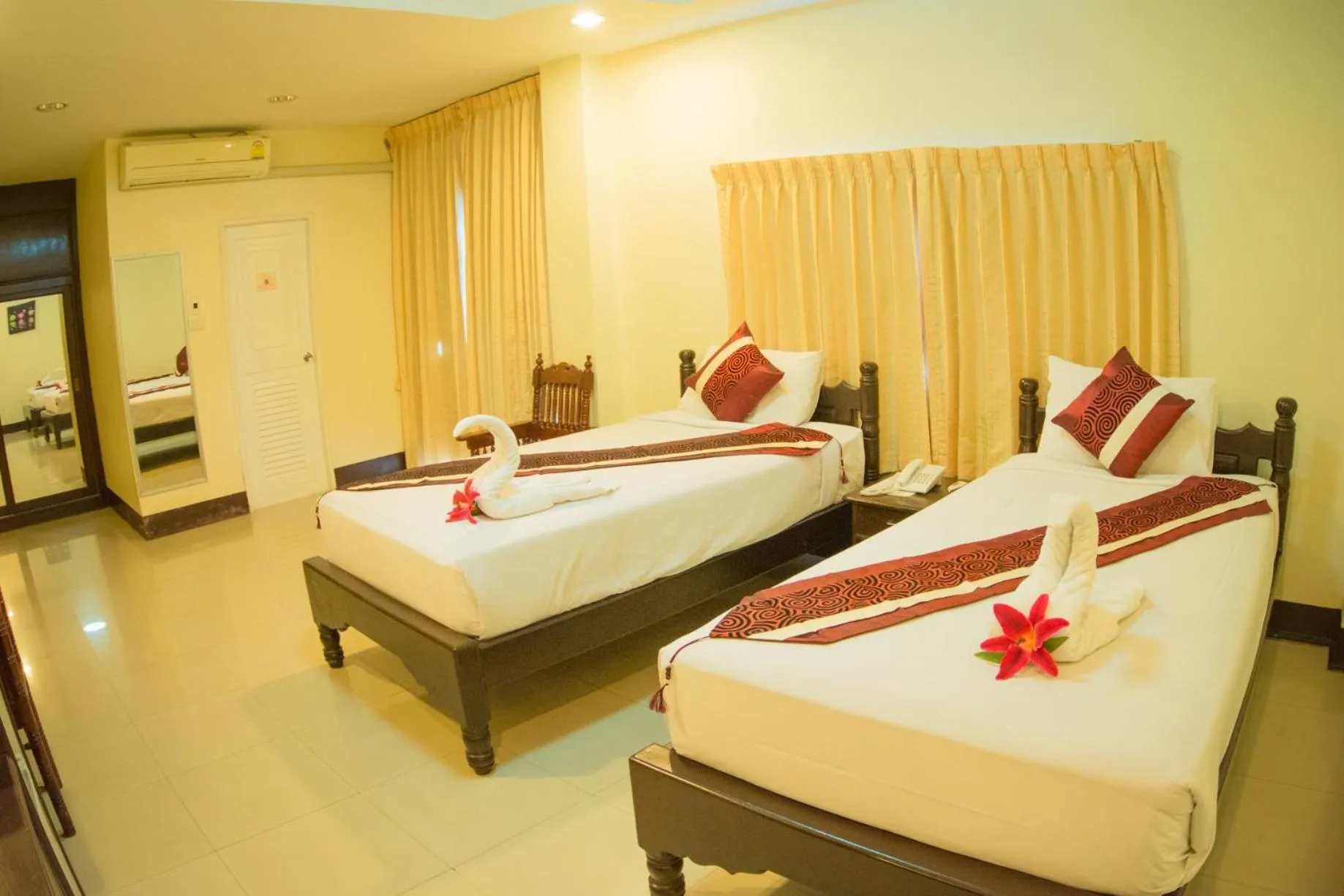 Bed in Submukda Phoomplace Hotel