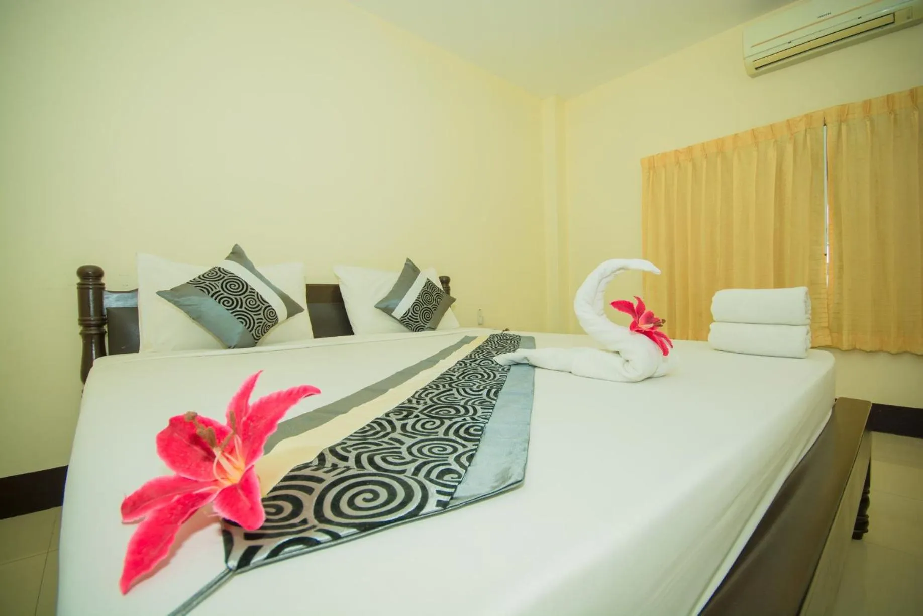 Bed in Submukda Phoomplace Hotel