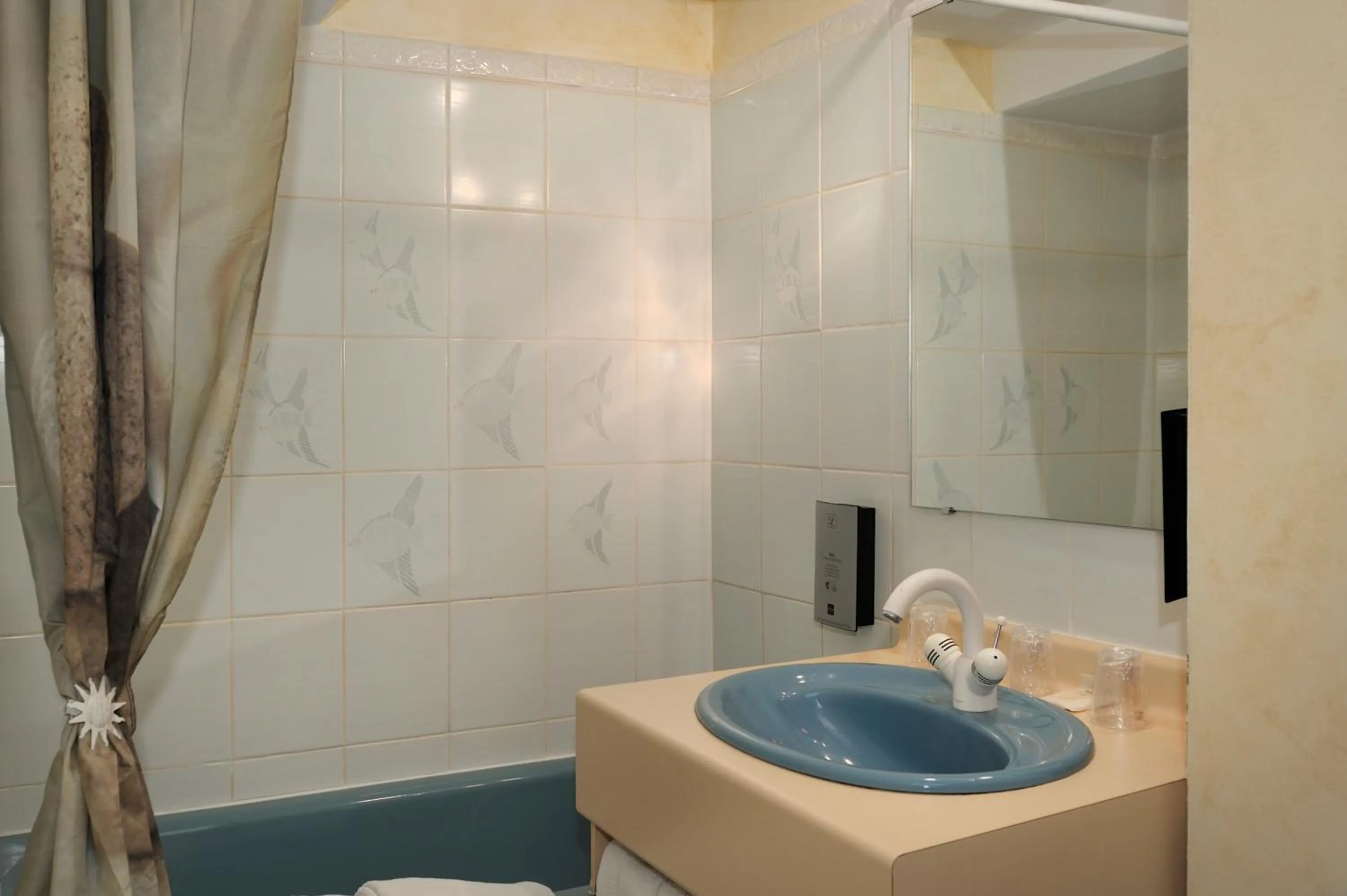 Bathroom in Logis Auberge À La Tête De Lard