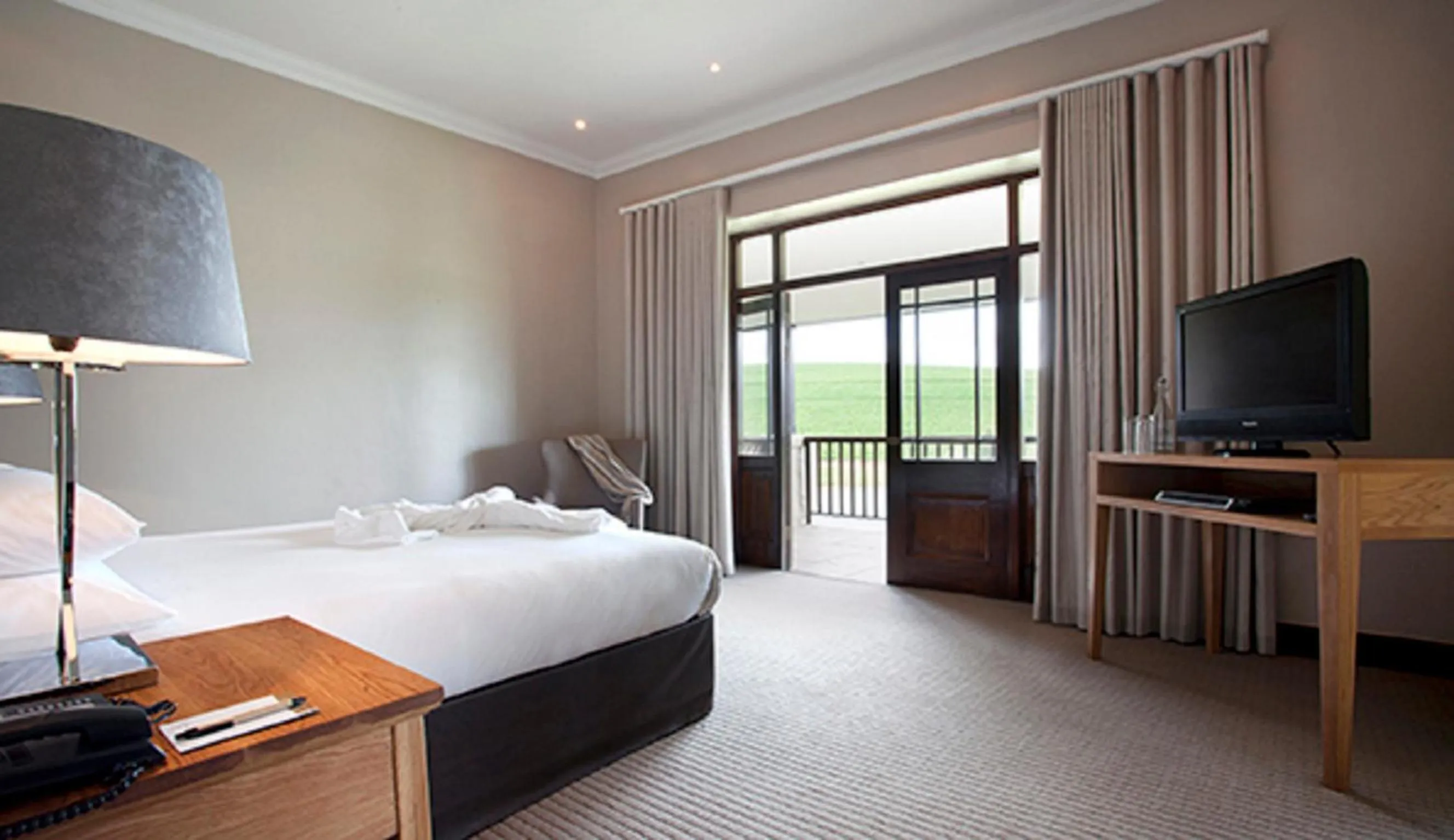 Bed in ASARA Wine Estate & Hotel