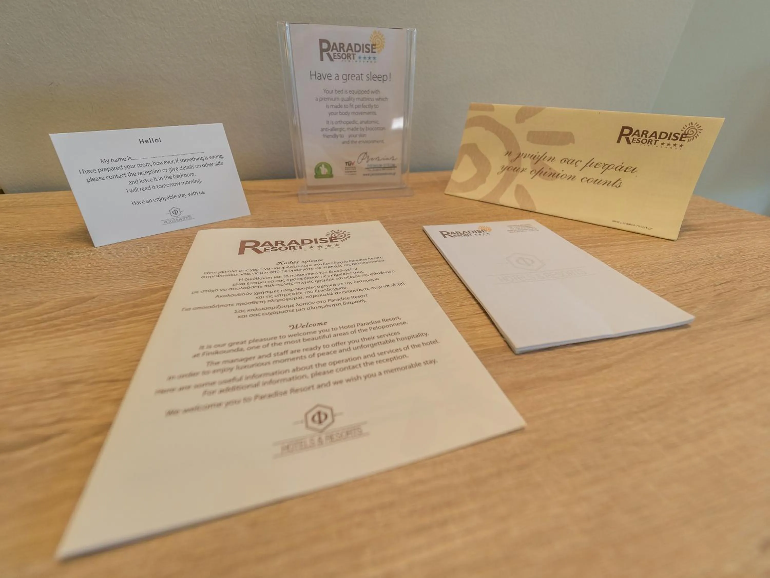 Property logo or sign in Paradise Resort