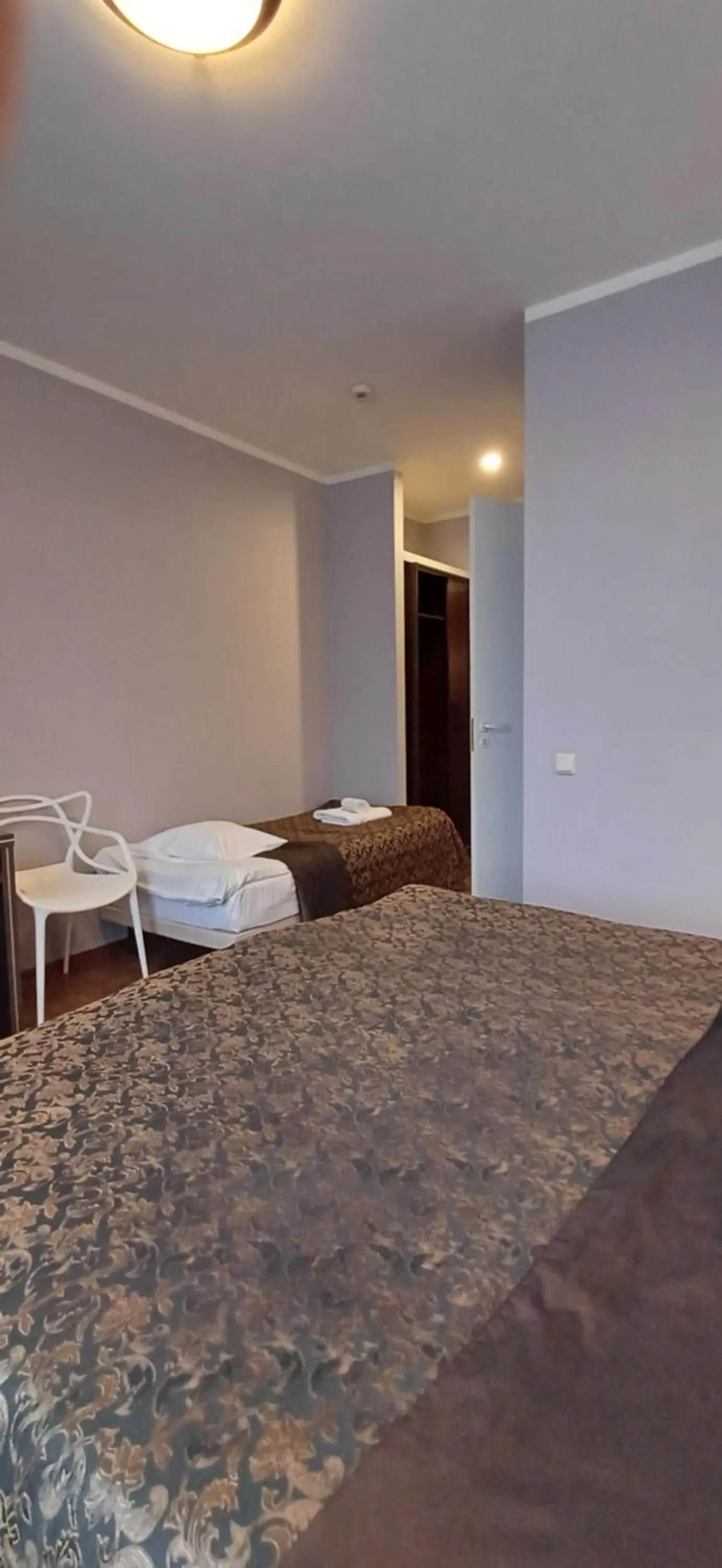 Bed in PRIMO Hotel Riga