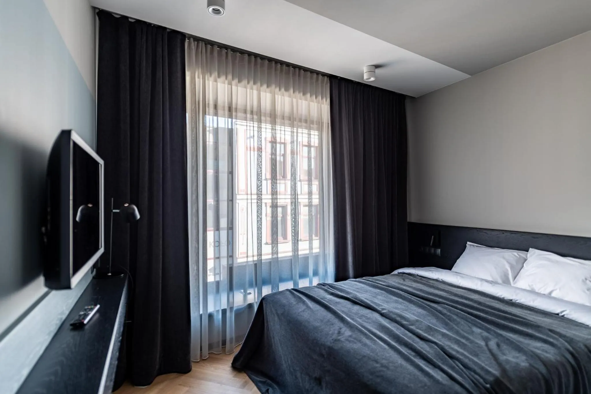 Bed in Maestro Design Hotel