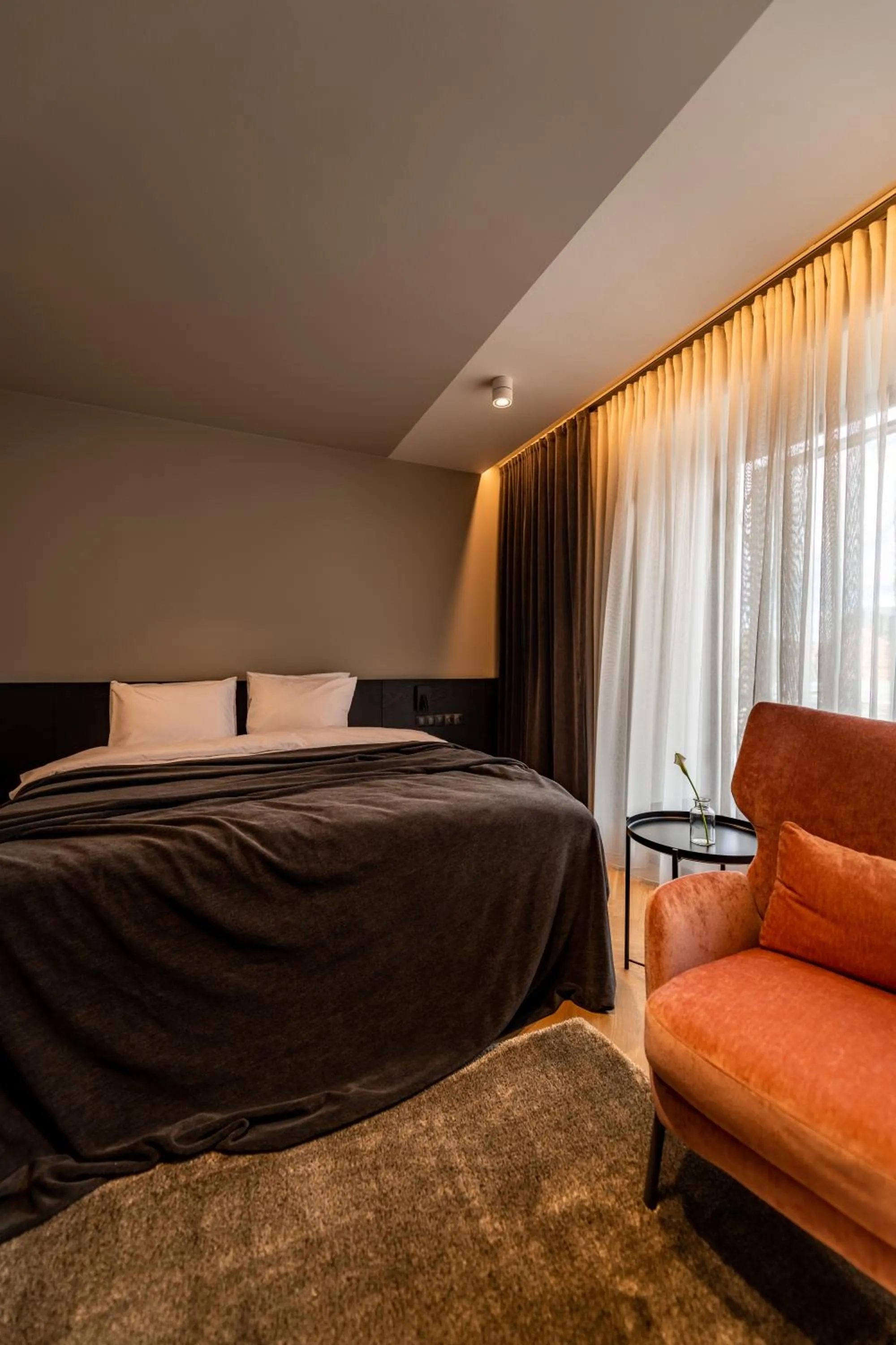 Bed in Maestro Design Hotel