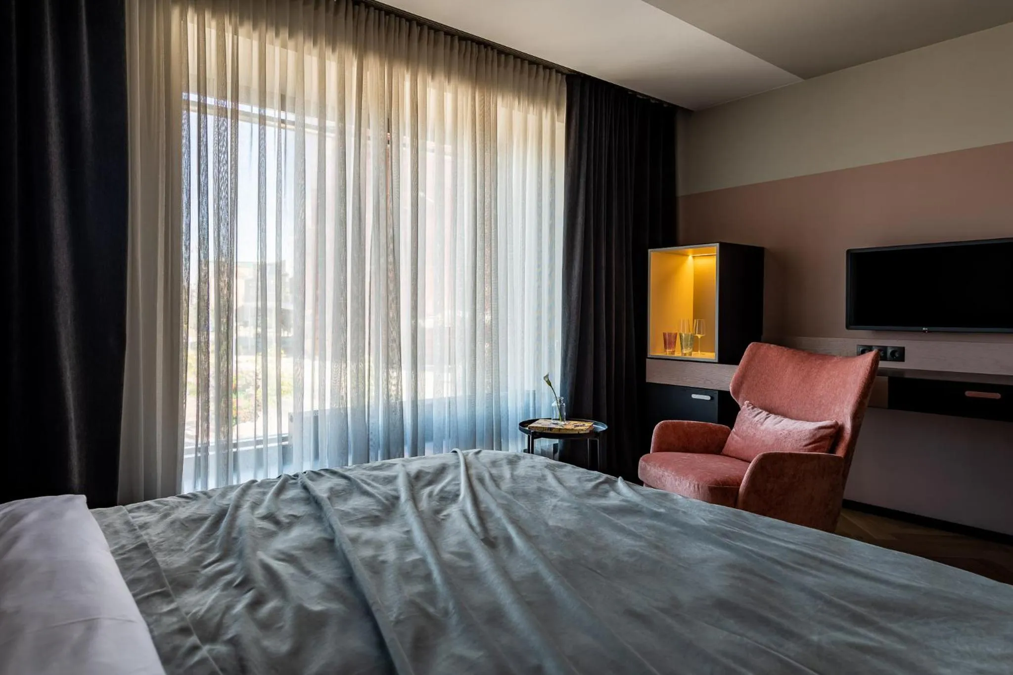 Bed in Maestro Design Hotel