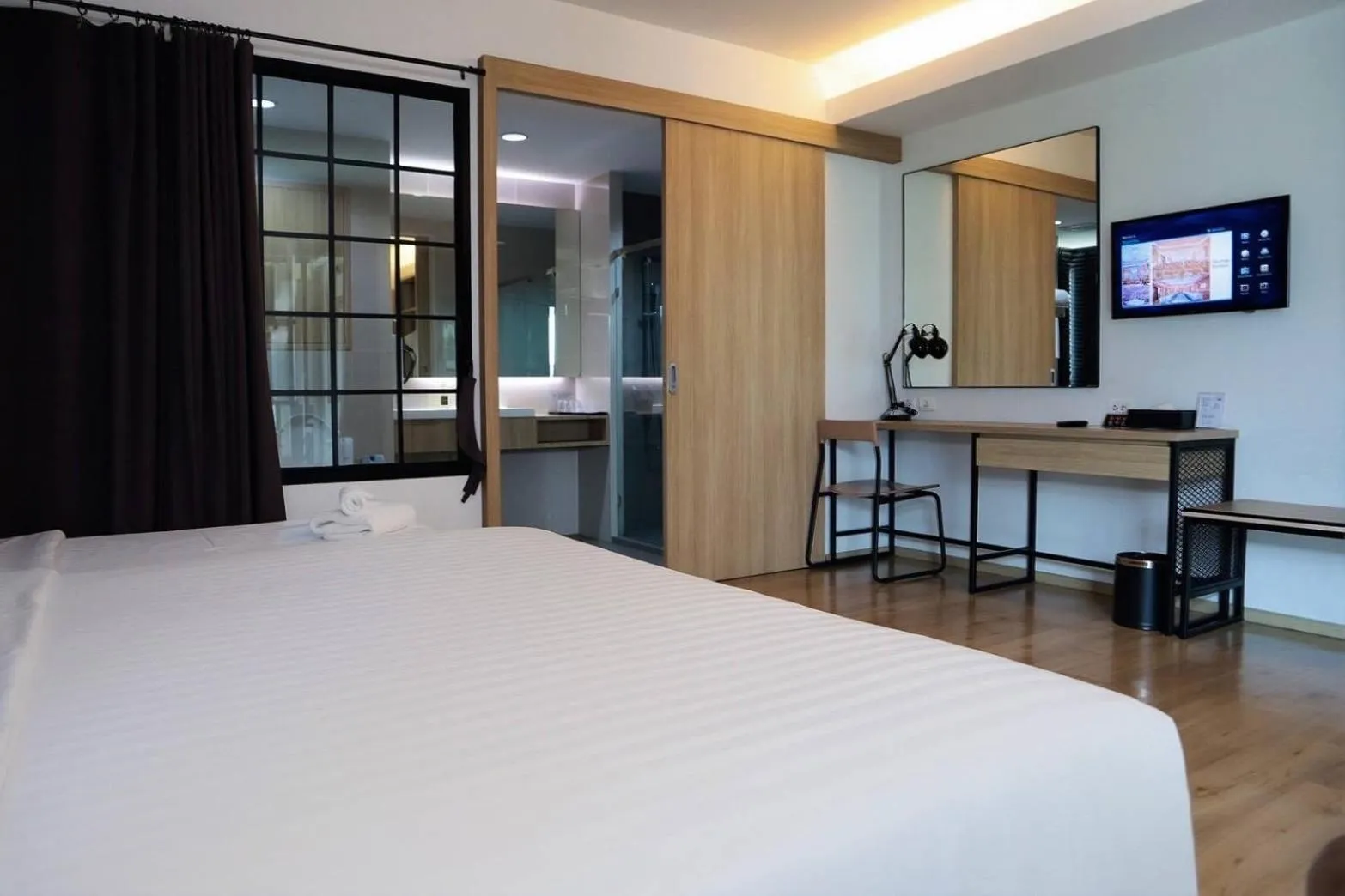 Bed in Mii Hotel Srinakarin