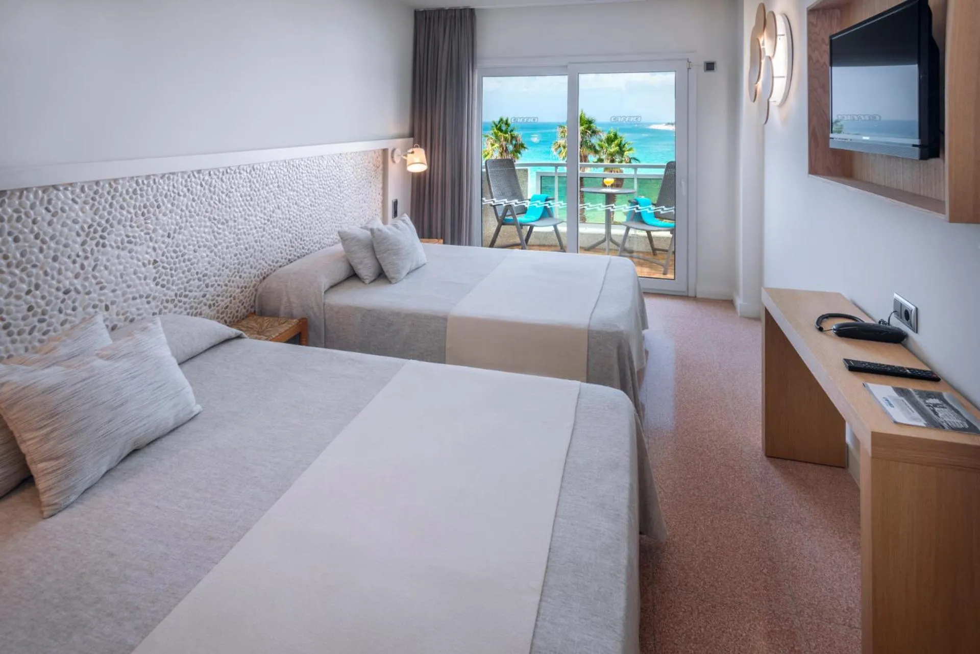 Bed in Caprici Beach Hotel & Spa