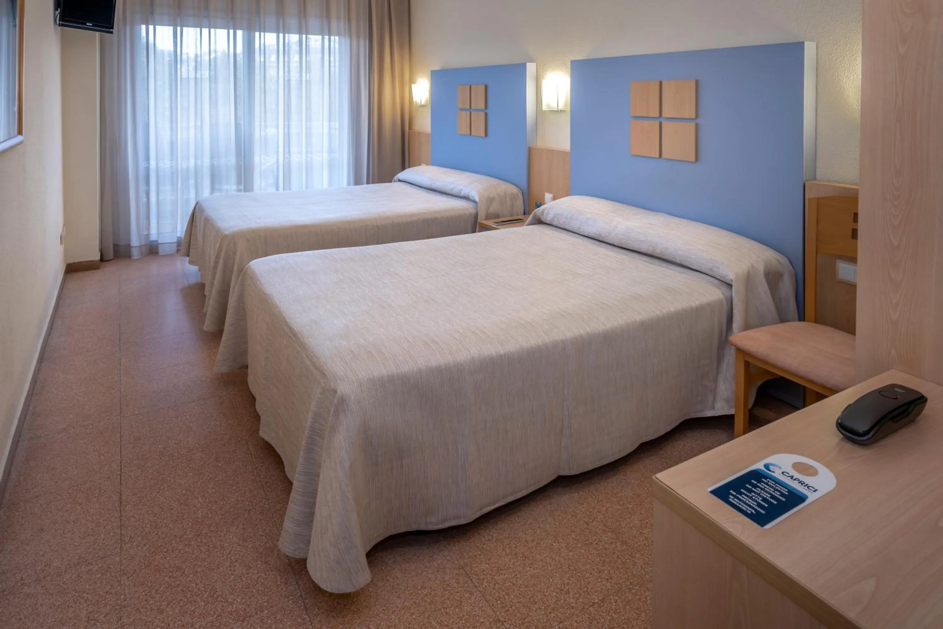 Photo of the whole room, Bed in Caprici Beach Hotel & Spa