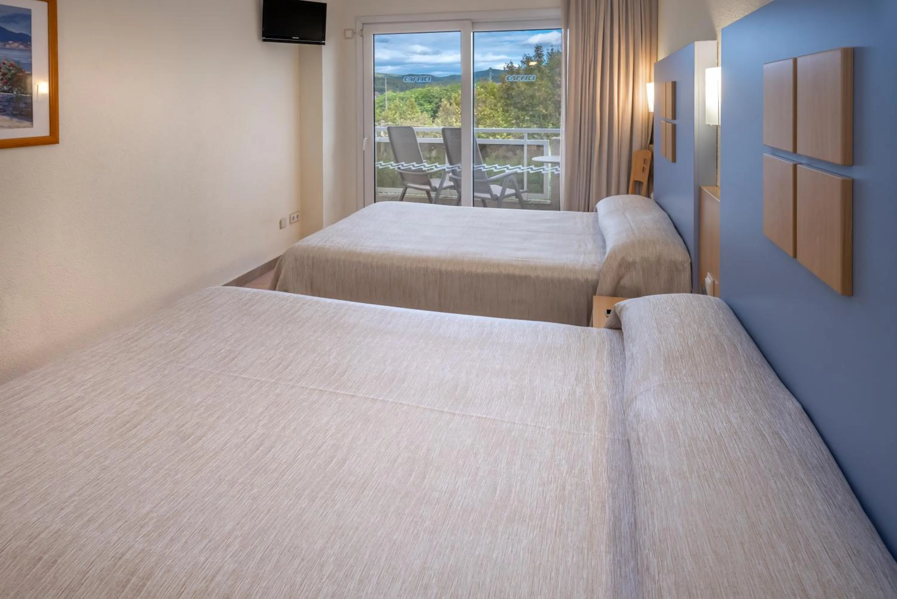 Photo of the whole room, Bed in Caprici Beach Hotel & Spa