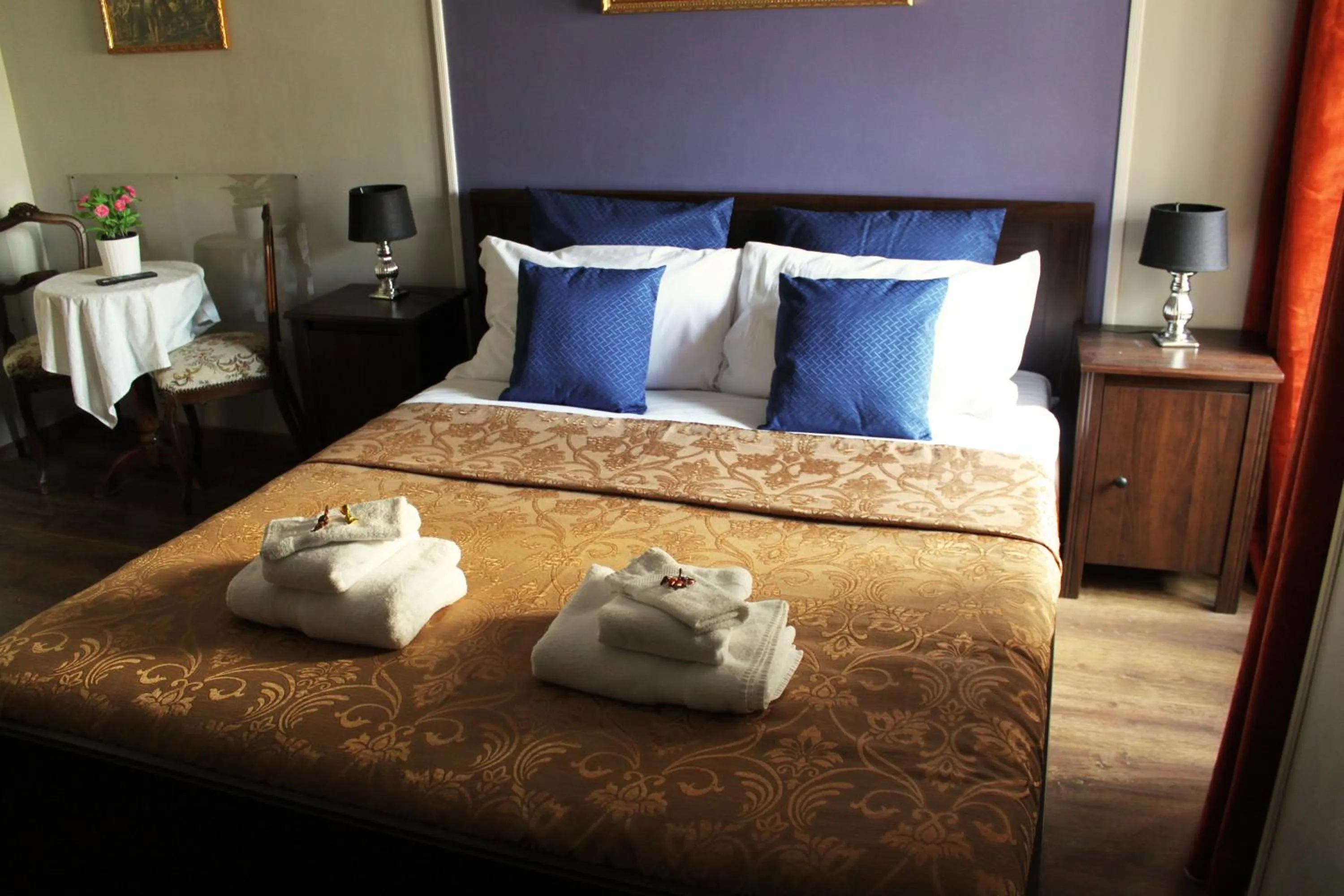 Bed in Raphael Rooms