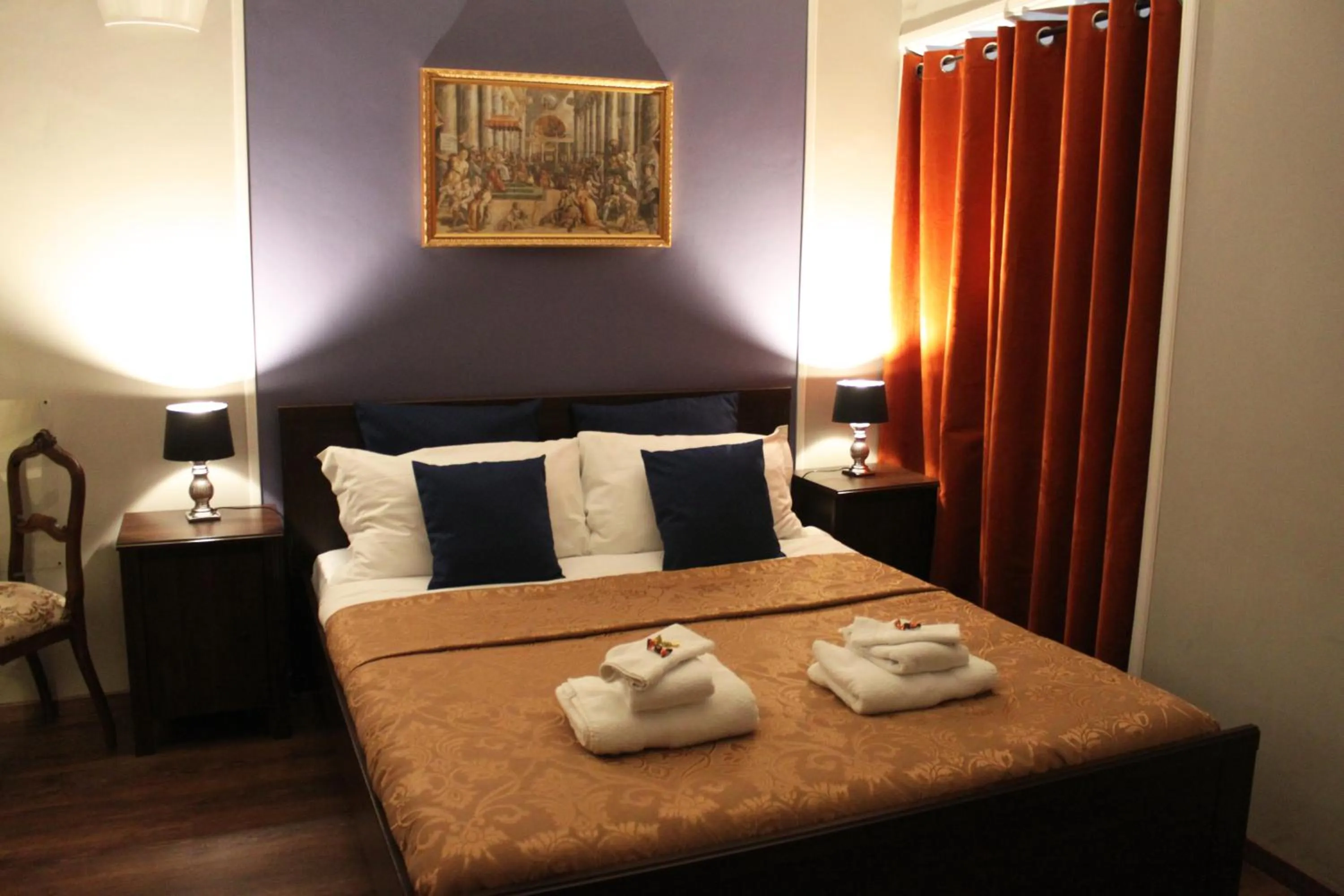 Bed in Raphael Rooms