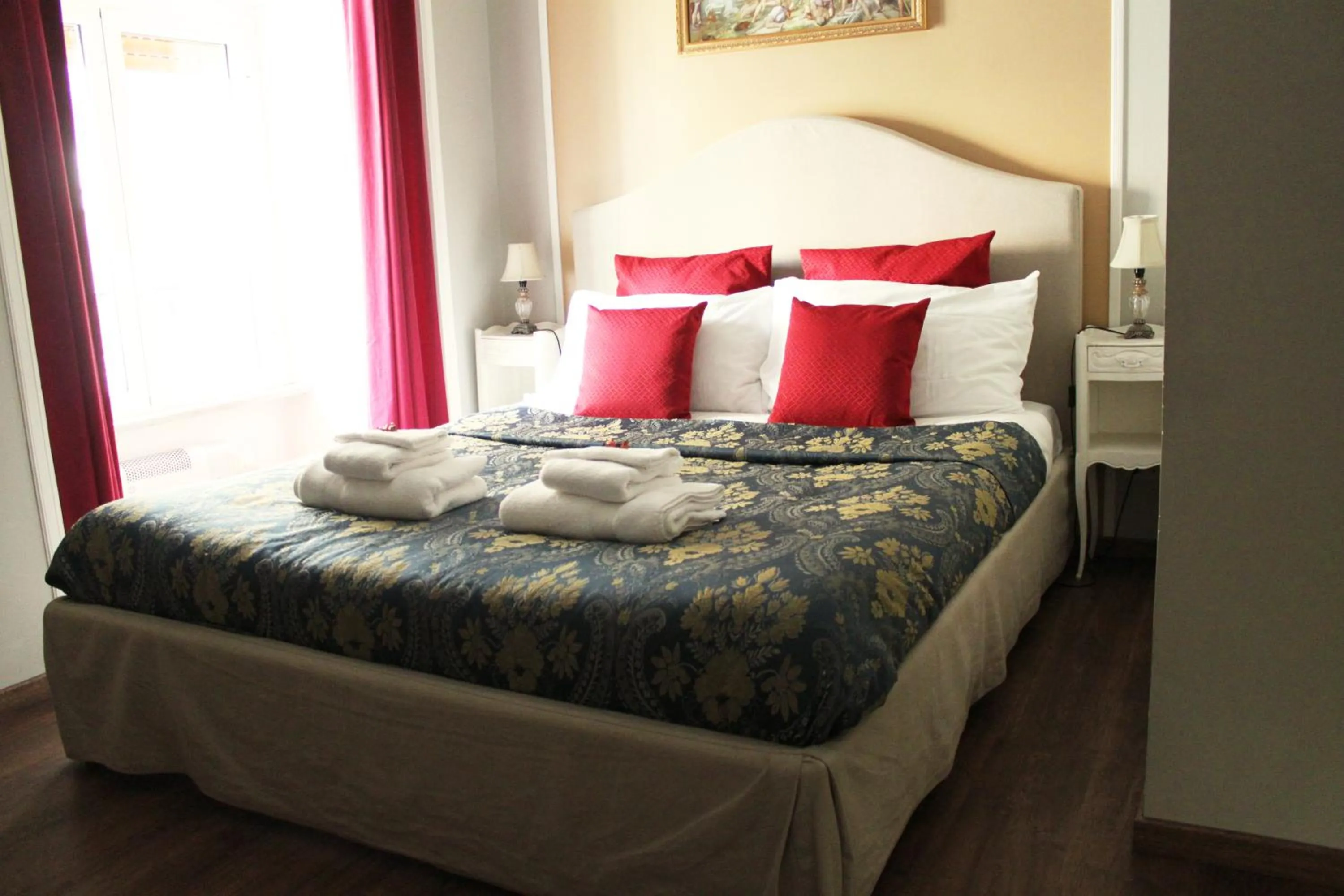 Bed in Raphael Rooms