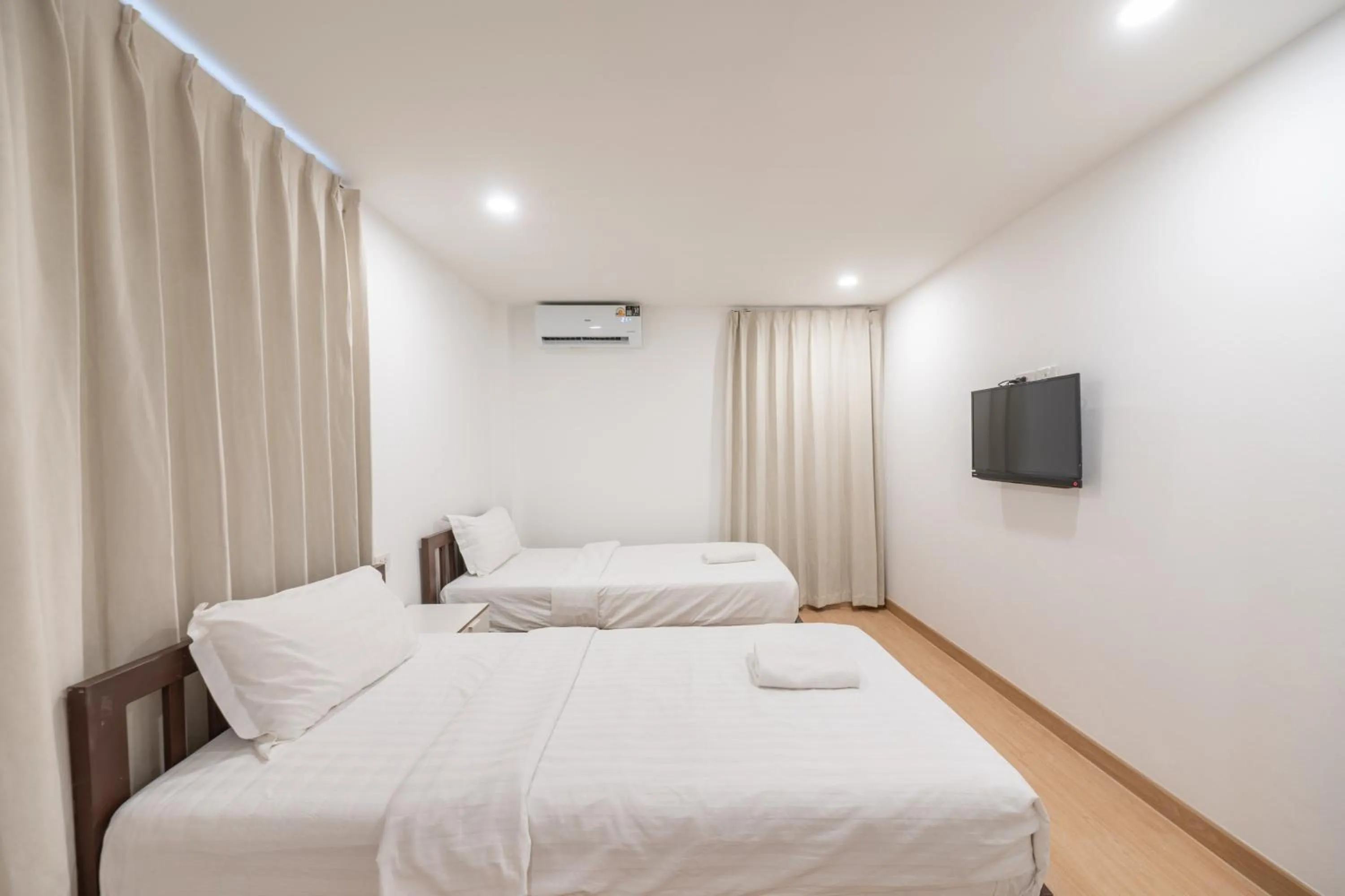 Photo of the whole room, Bed in We Inn