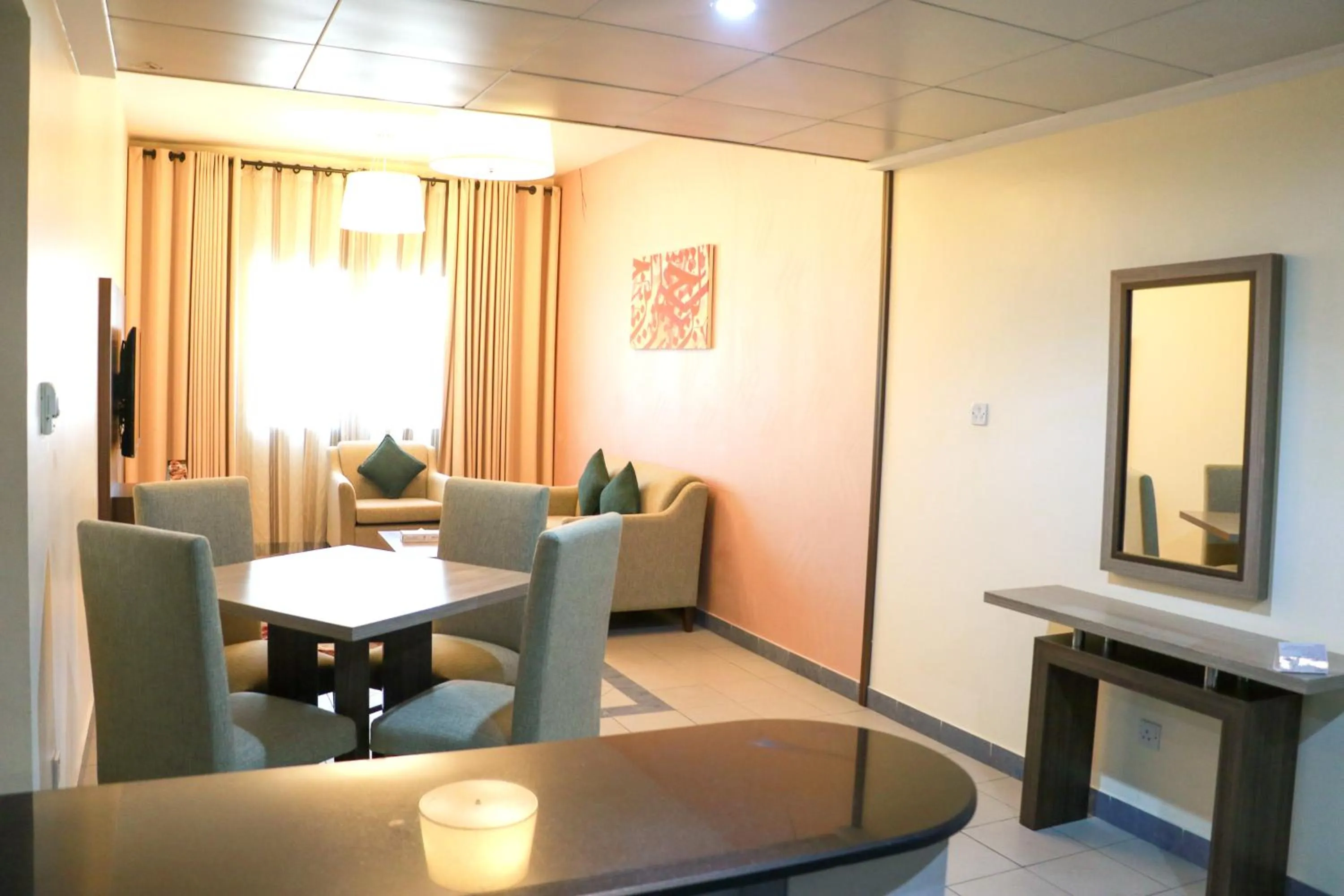 Communal lounge/ TV room in Spark Residence Hotel