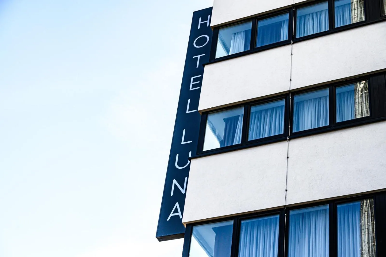 Property logo or sign in Hotel Luna