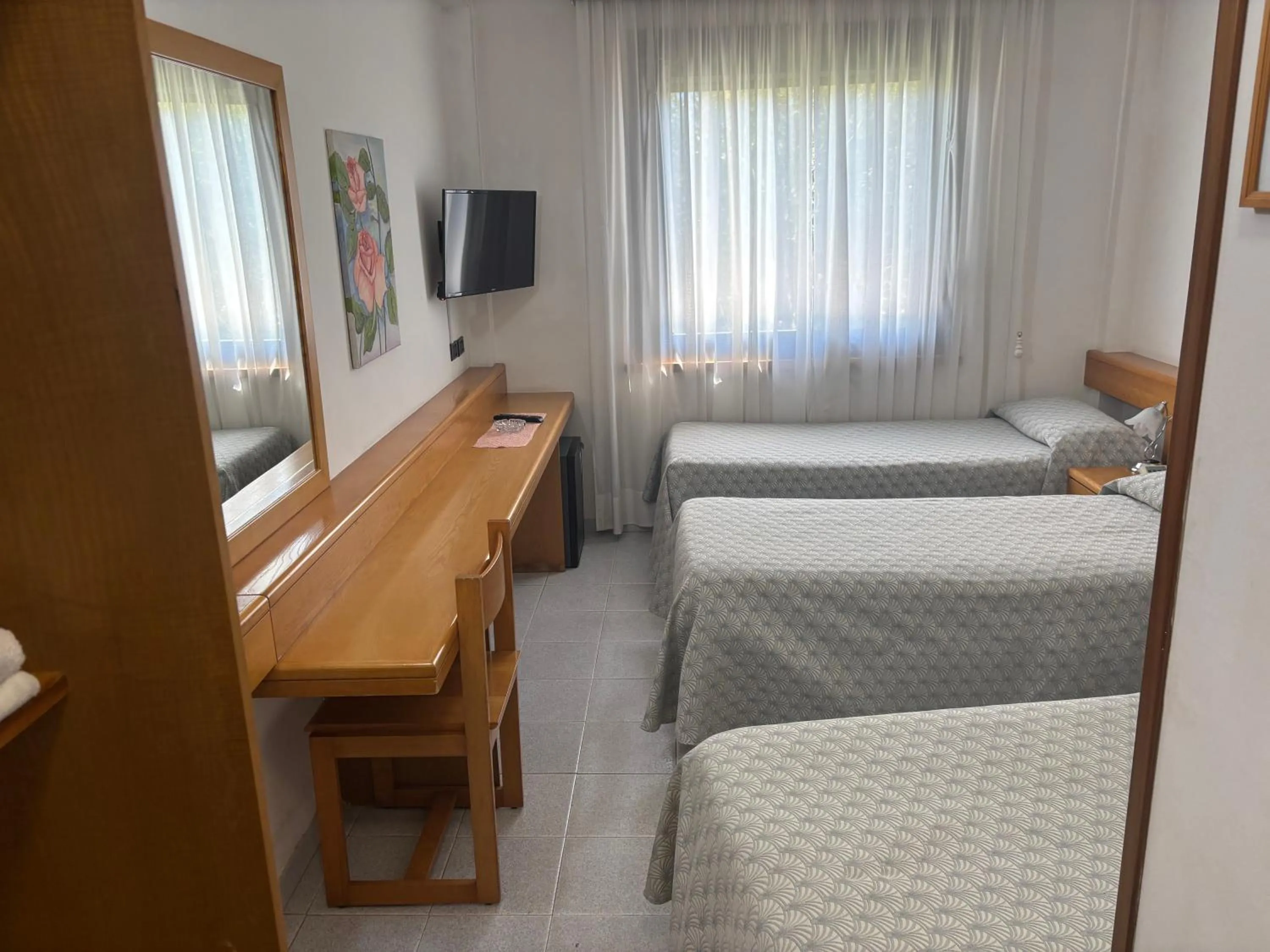 Bed in Hotel Le Palme