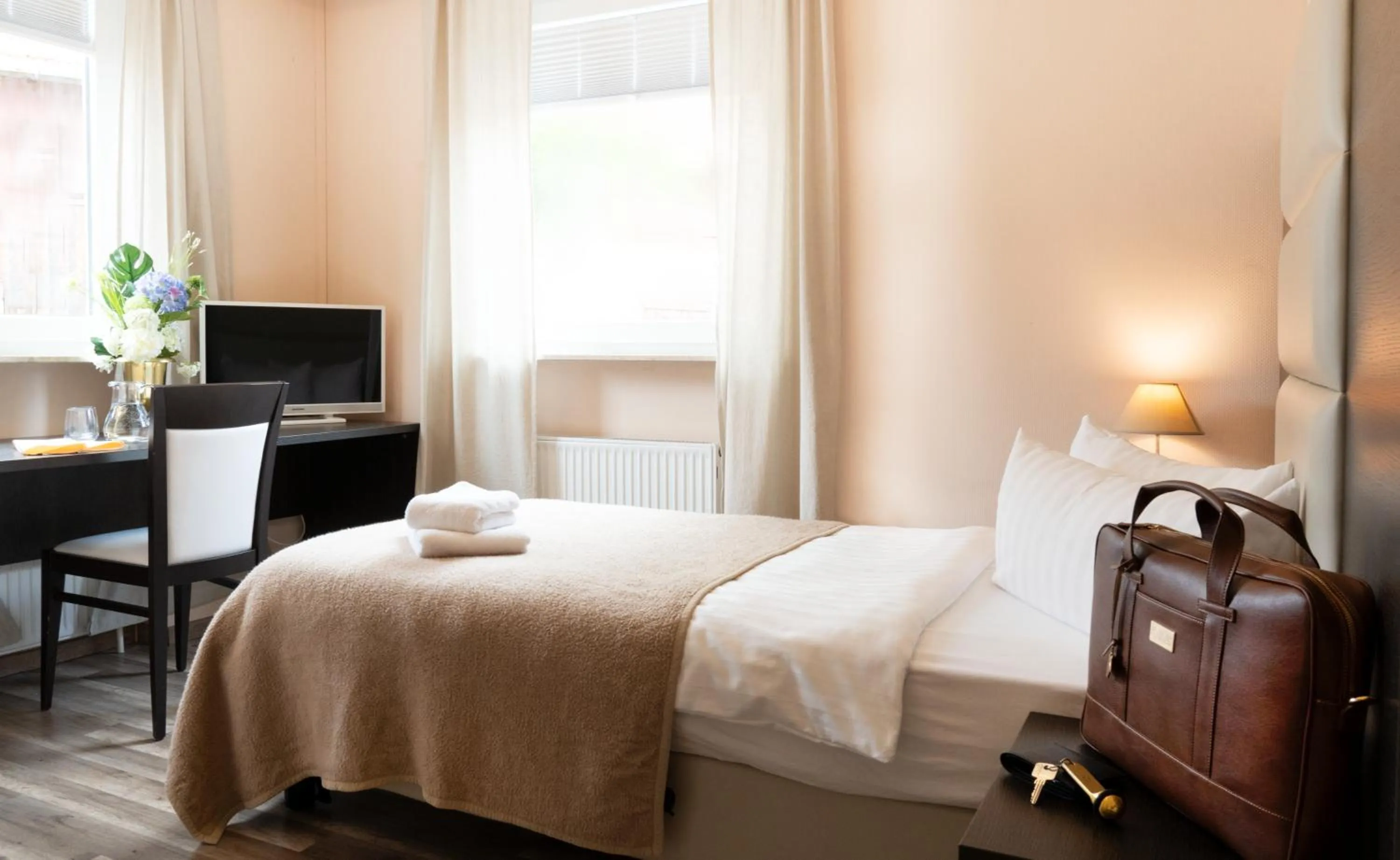 Bed in Häuser der Villa Italia