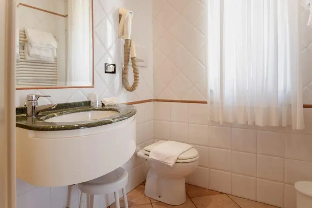 Quadruple Room (2 Adults + 2 Children) in Hotel Rossi Quadruple Room (2 Adults + 2 Children) in Hotel Rossi